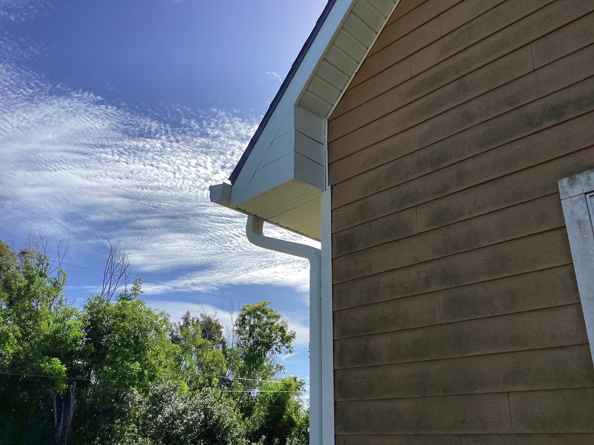 Soffit & Fascia White + New Downspouts by Gutter Professors