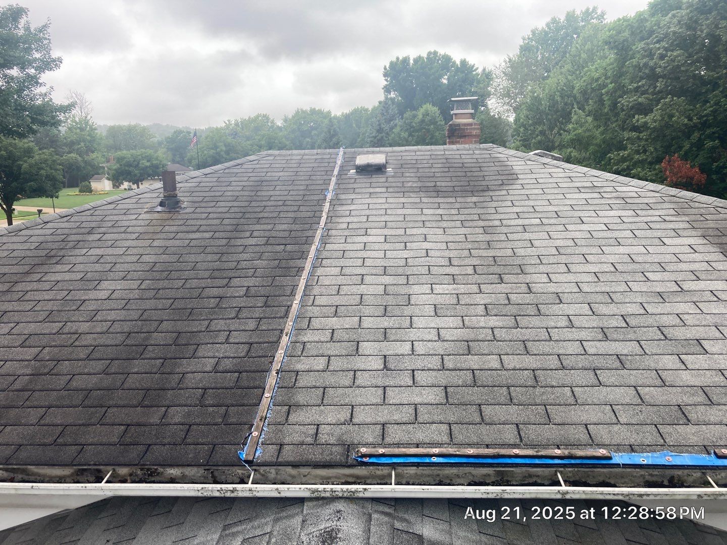 Shingle Roof Replacement by Absolute Roofing and Construction