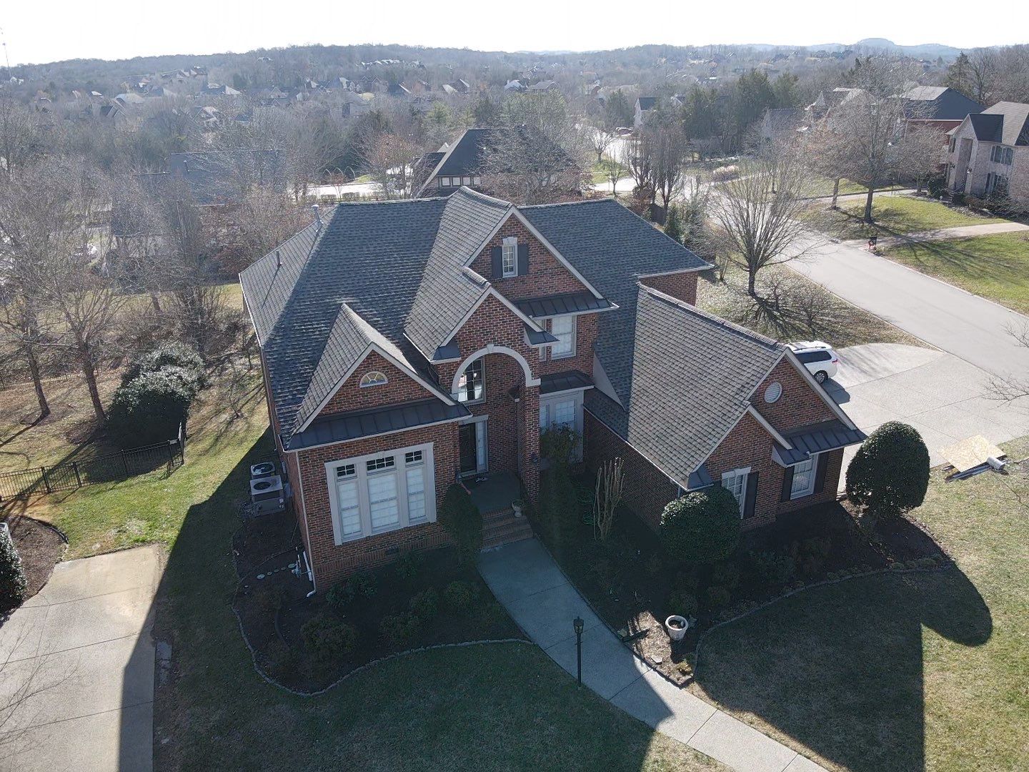 Residential Roofing Installation using GAF Timberline HDZ Weathered Wood Shingles by Undersun Roofing 