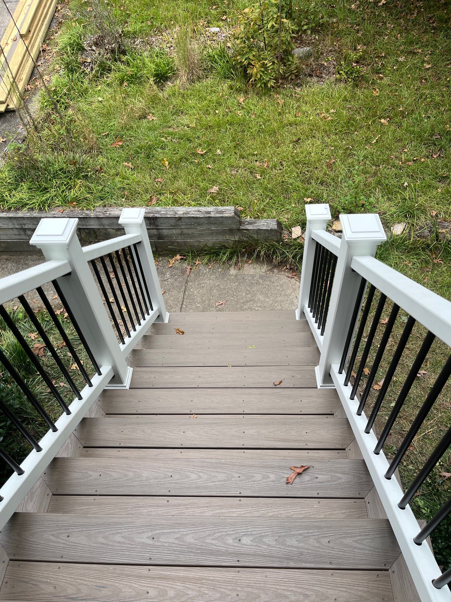Deckorators Deck Resurface on Front Porch and Wood Deck Resurface on Back Deck by Nelson Exteriors 