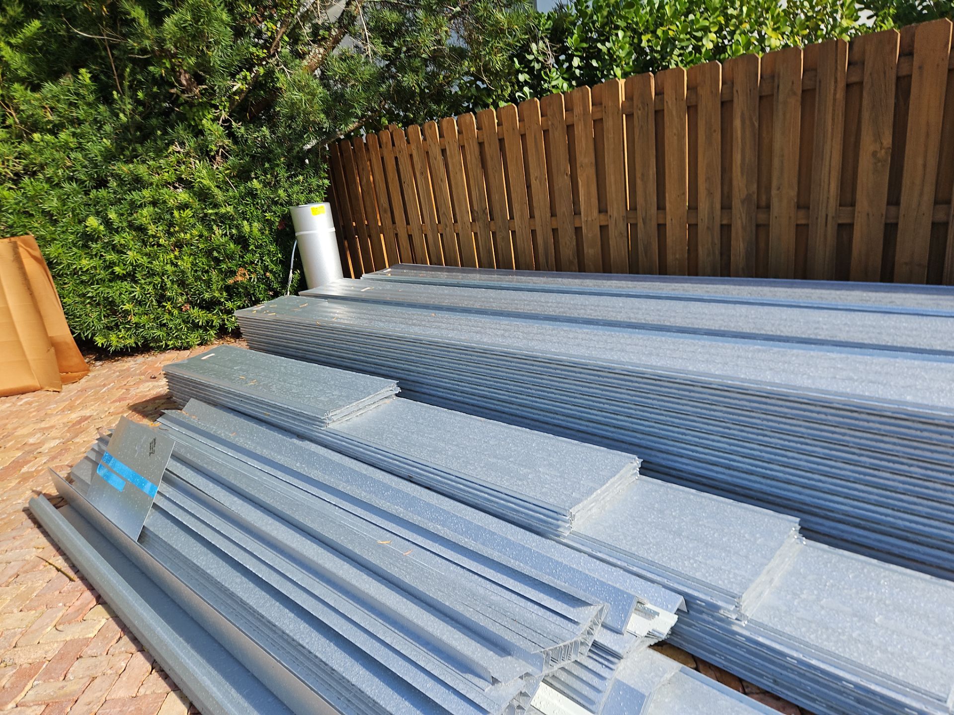 Residential Roofing Installation using 1" Nail strip metal roof by BLUES BROTHERS CONSTRUCTION CORP