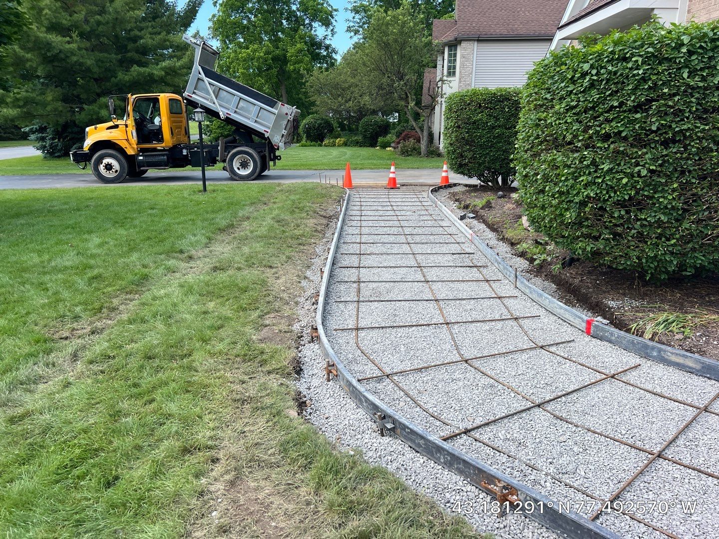 Heavy stone stamped concrete patio and sidewalk  by NG Masonry & Construction LLC