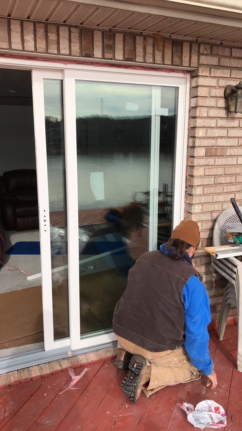 Deck Refurbush and Door Replacement using Trex Decking and Railing.  Polaris Patio Doors by Secure Construction Company Inc