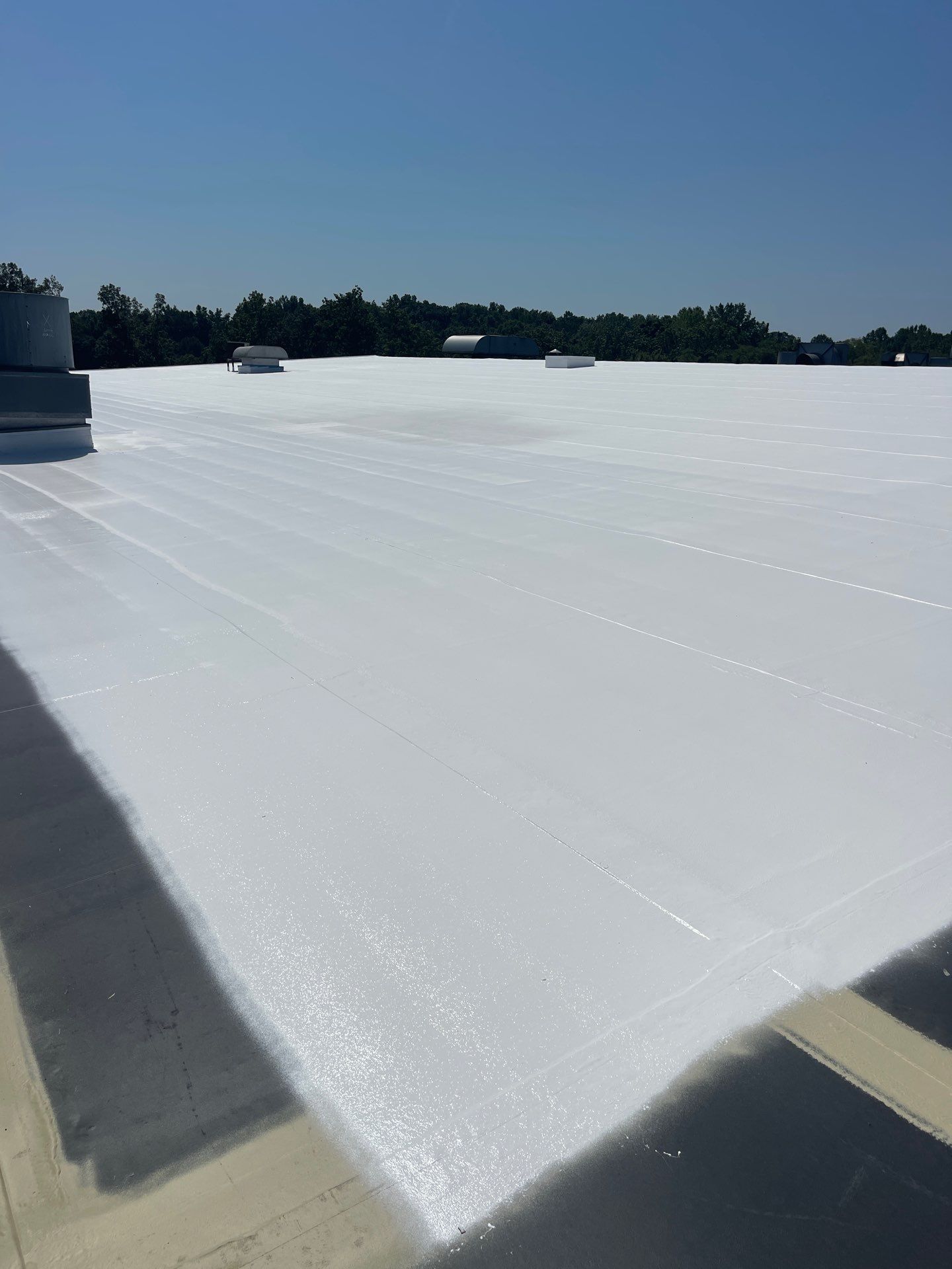 Commercial Roofing Installation using Coatings by Kentucky Commercial Roofing