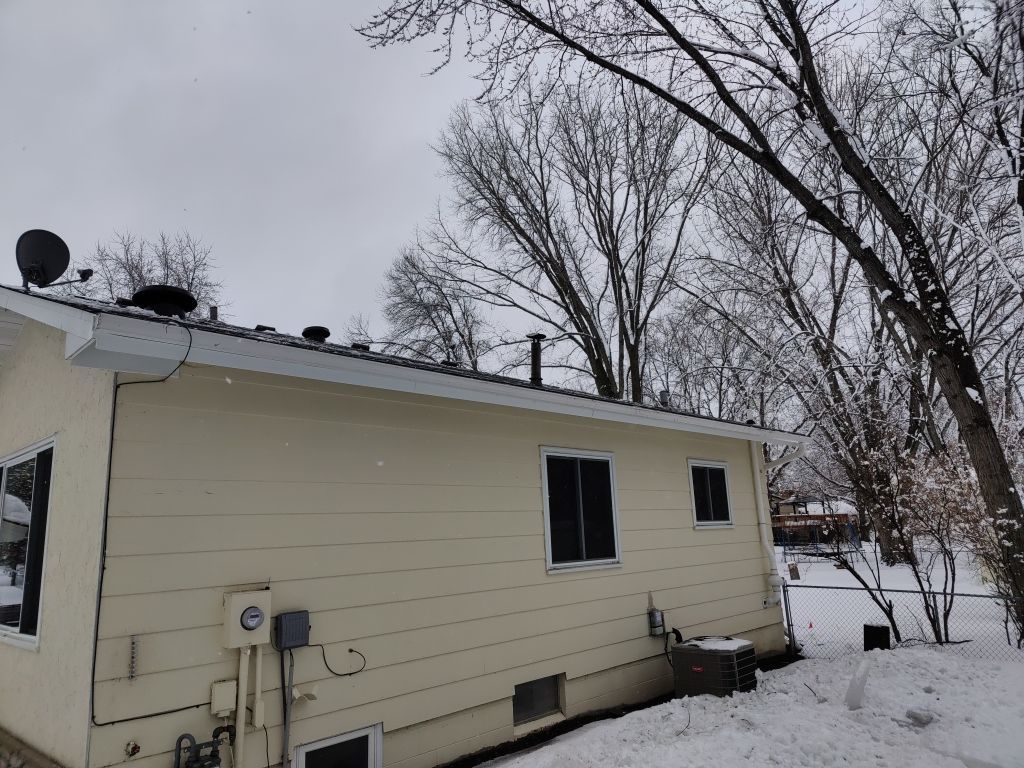 Ice Dam Steaming in Maple Grove by Next Level Seamless Gutters / Exteriors Inc.
