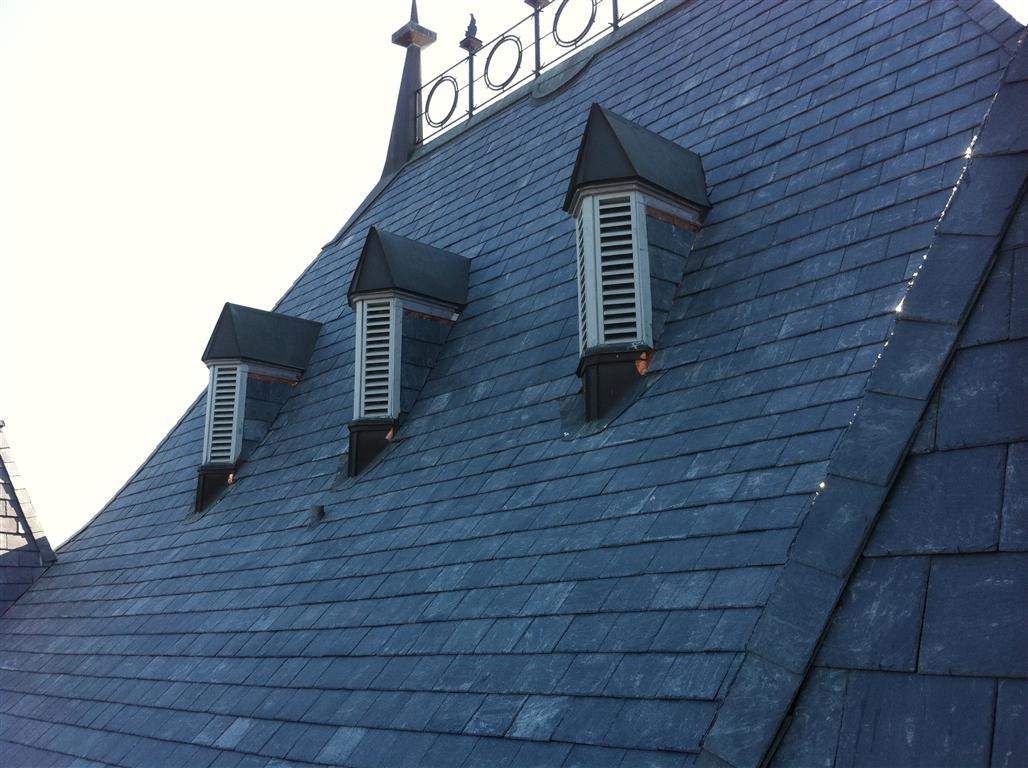 Historic Building ROOF REPLACEMNT with GAF TruSlate  on steep slop and Versico 60mil TPO on flat roof by Gorilla Exteriors Contracting, LLC