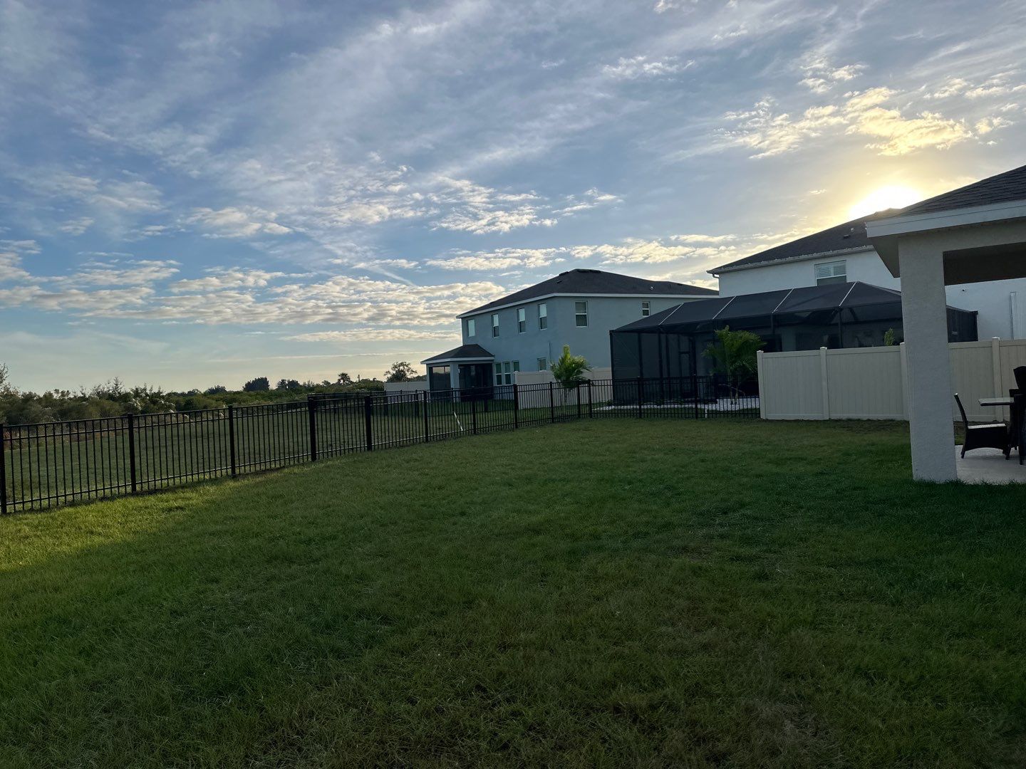 Vinyl Fence Installation using Vinyl Fence and a Black 3 Rail Aluminum Fence by Asap fence and gates, LLC