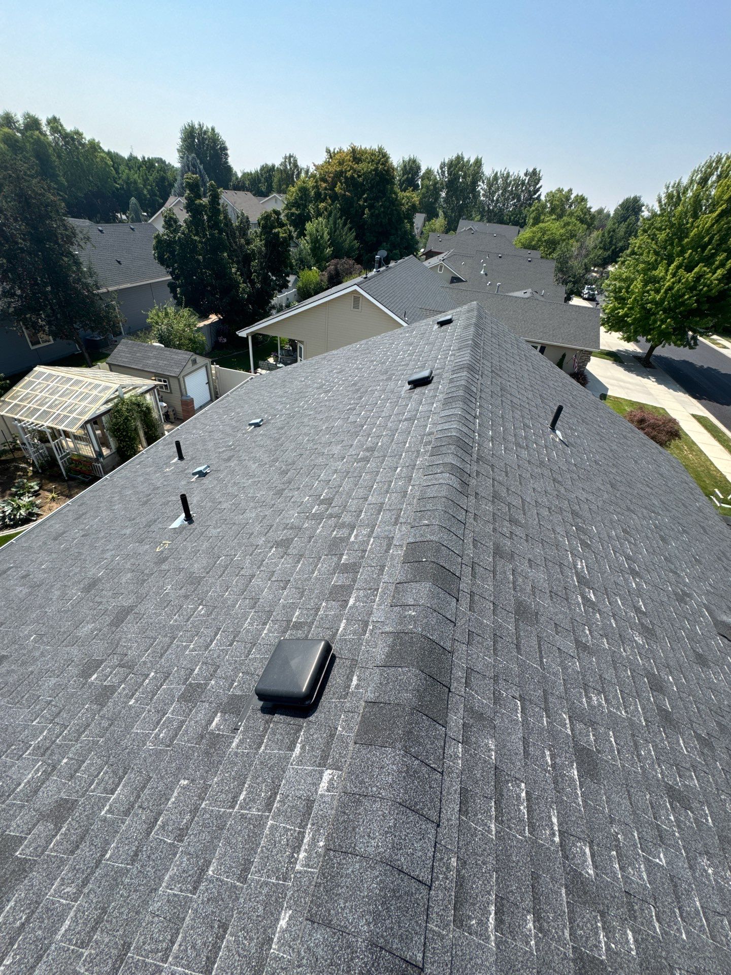 Meridian Residential Roof Replacement Using Dark Gray Architectural Shingles by Olive Roofing