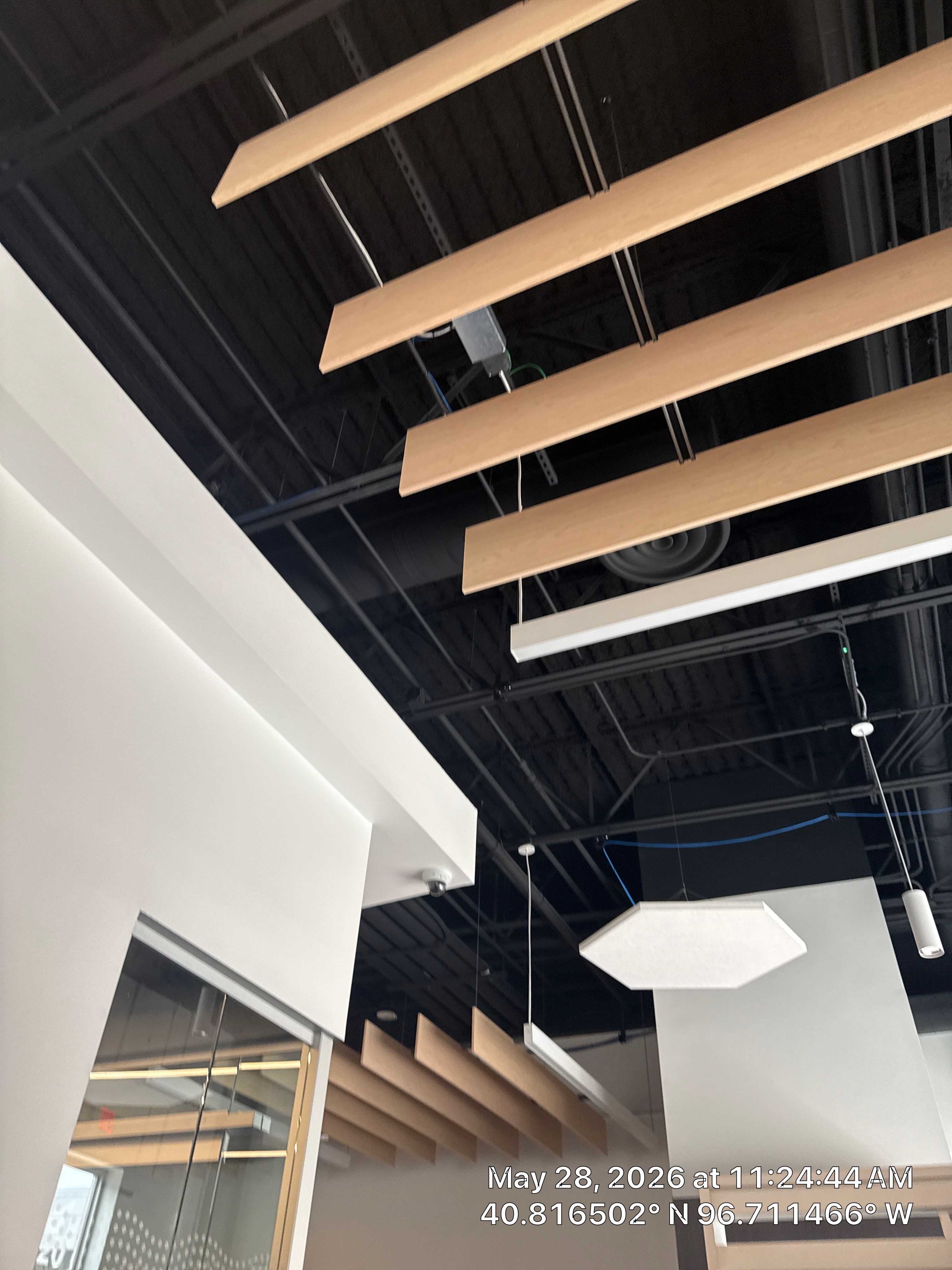Lincoln Office Modernization Featuring Custom Baffles and AV Installation by CompanyCam Sales Demo