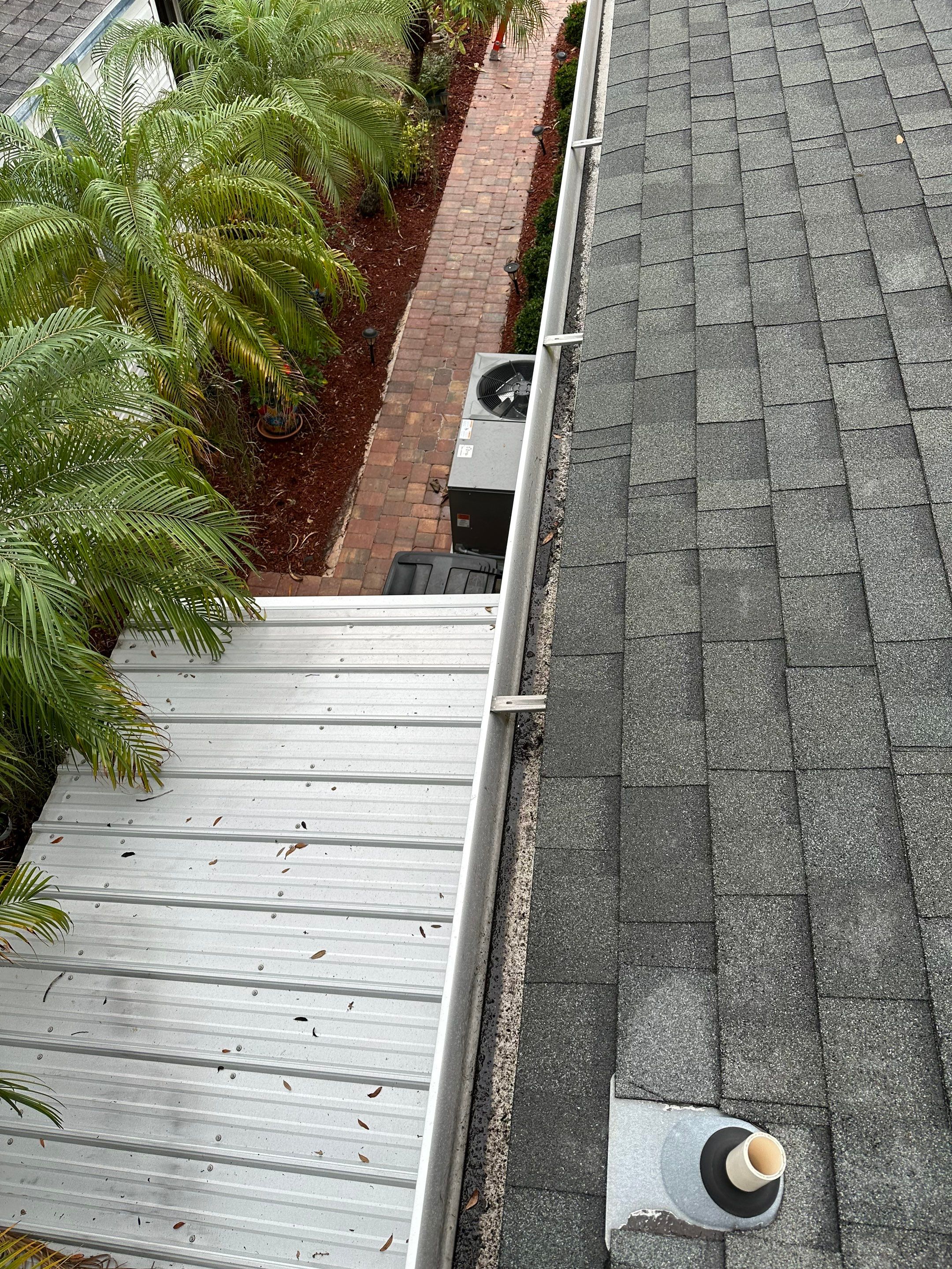Gutter Cleaning and House Washing Services  by Sunshine AquaWash