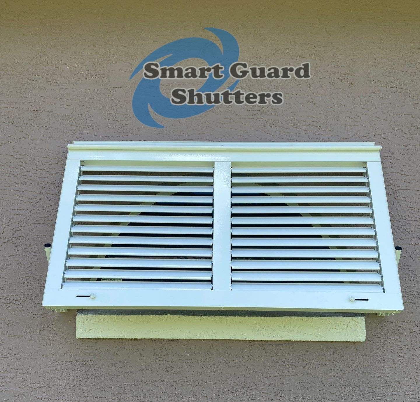 Impact Bahama Shutters in Signal White by Smart Guard Shutters
