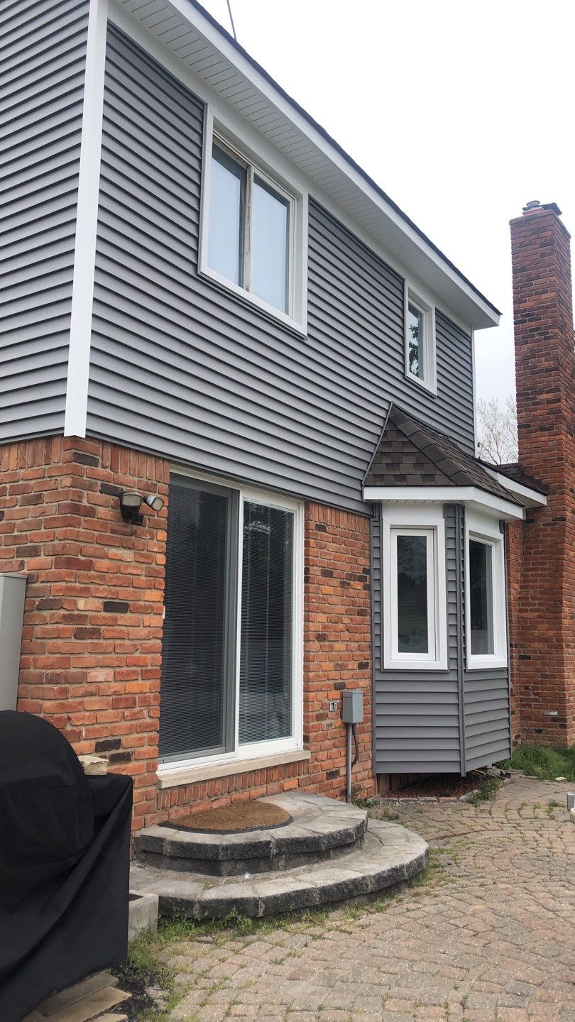 Siding Replacement - Private Residence  by Bloomfield Construction & Restoration