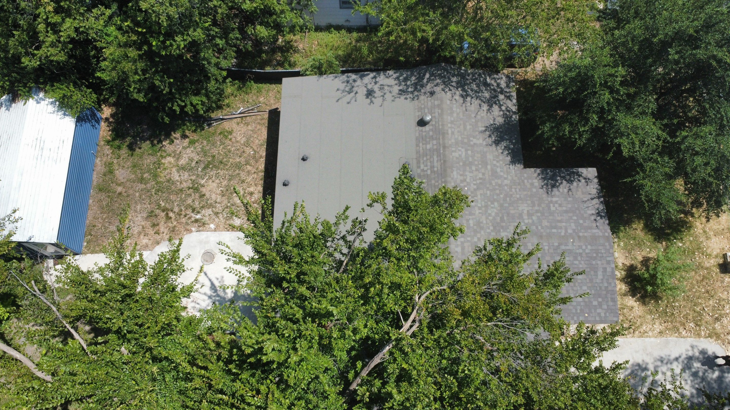Mixed Roof System – Oakridge Driftwood + Flat Roof Section | Austin, TX by Kstylez Roofing & Construction