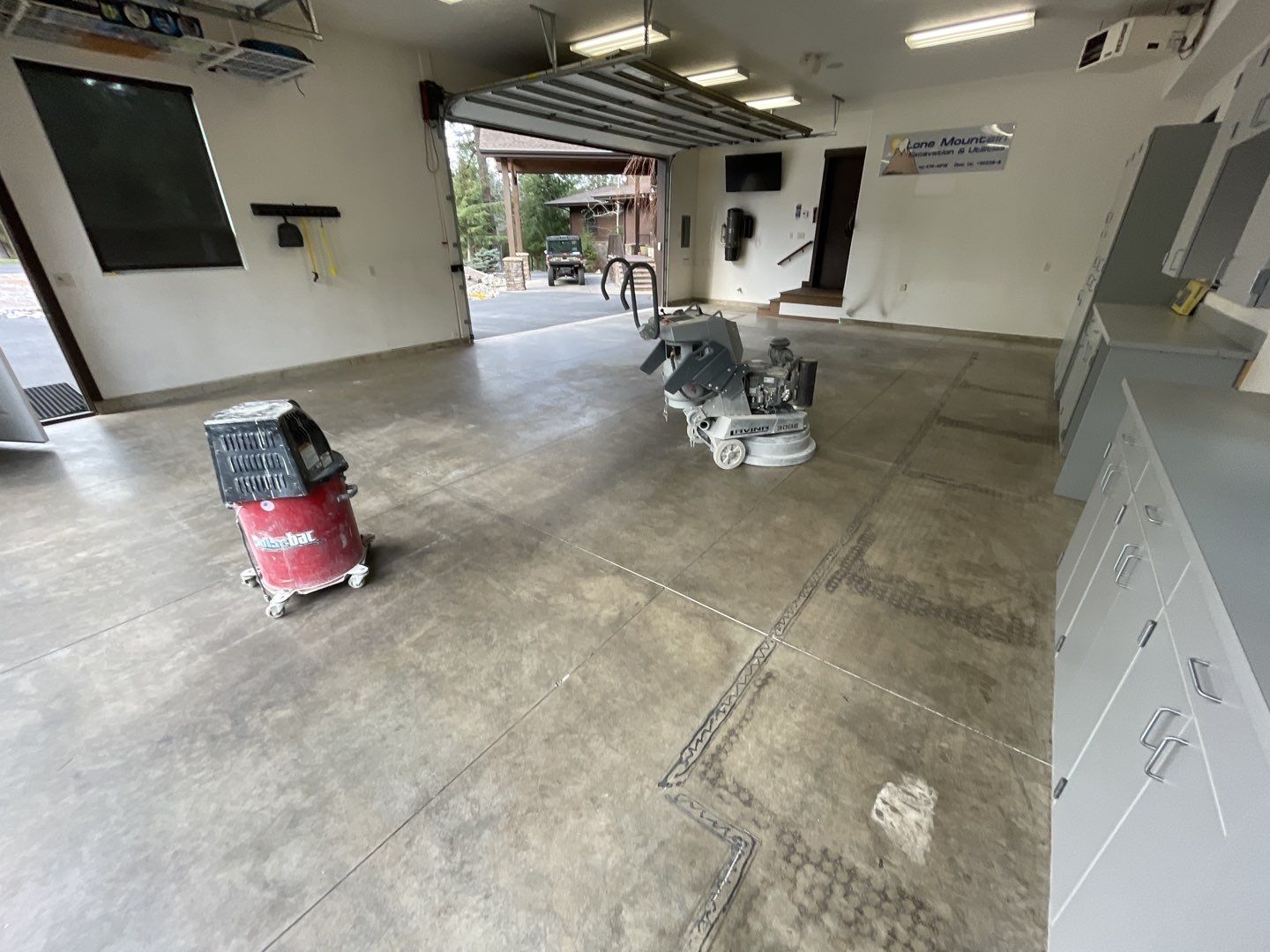 Garage Transformation using Smoke and the Penntek Evolution System by Croc Coatings, LLC