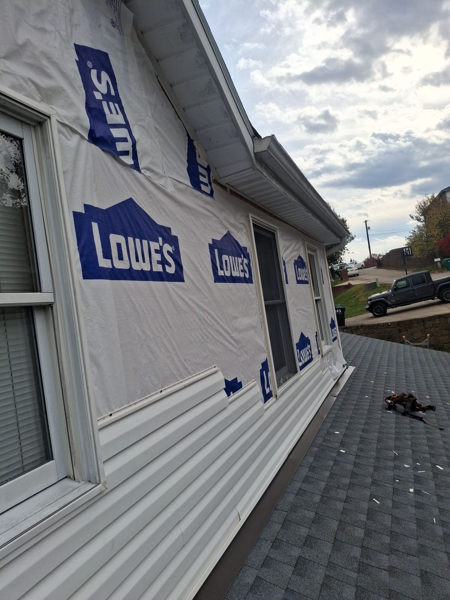 Residential Roofing Installation using GAF Timberline HDZ Oyster Grey by Rainstoppers Roofing