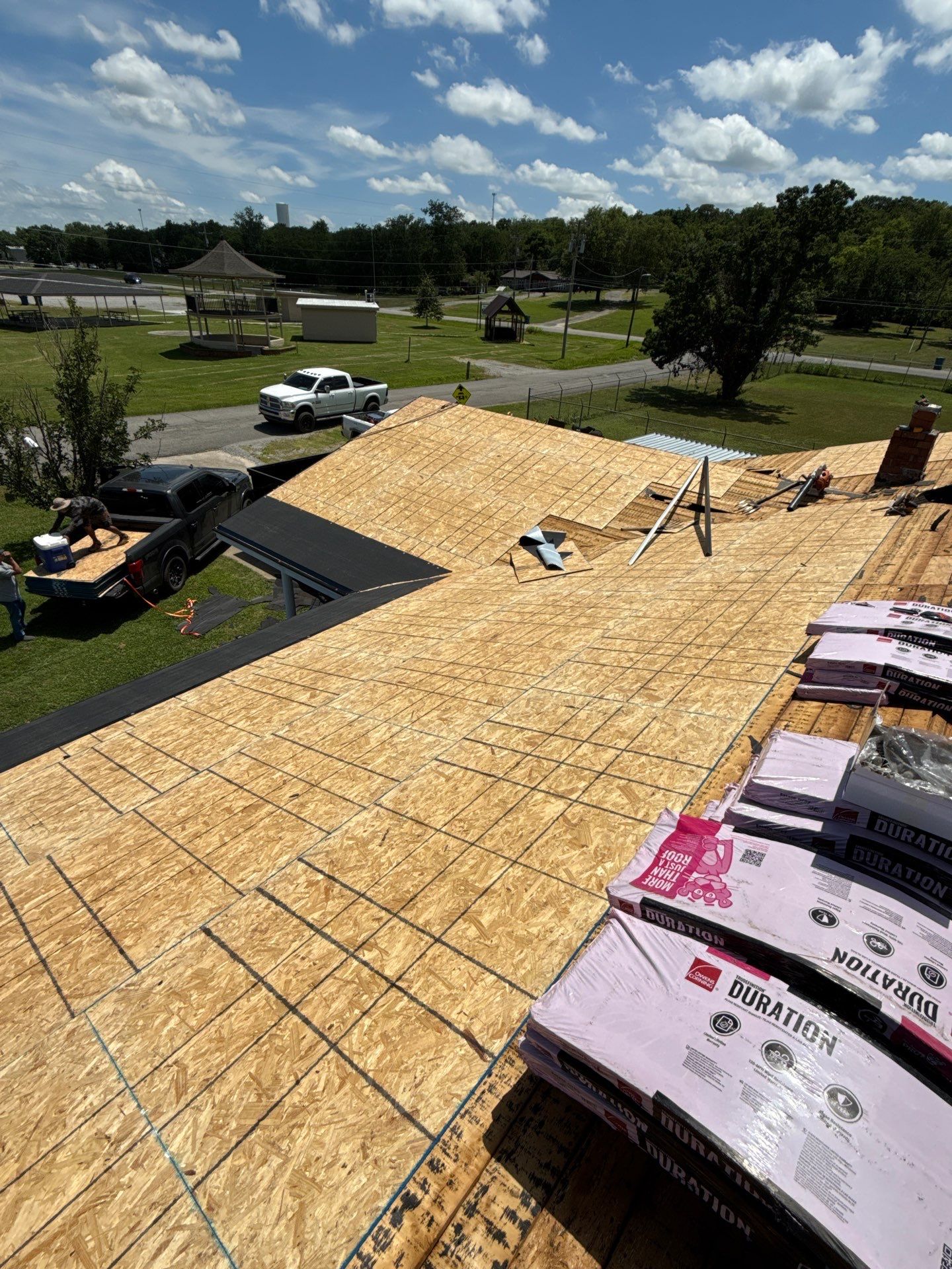 New roof & siding paid by insurance. Along with new roof sheathing.  by In & Out Construction & Remodeling, LLC