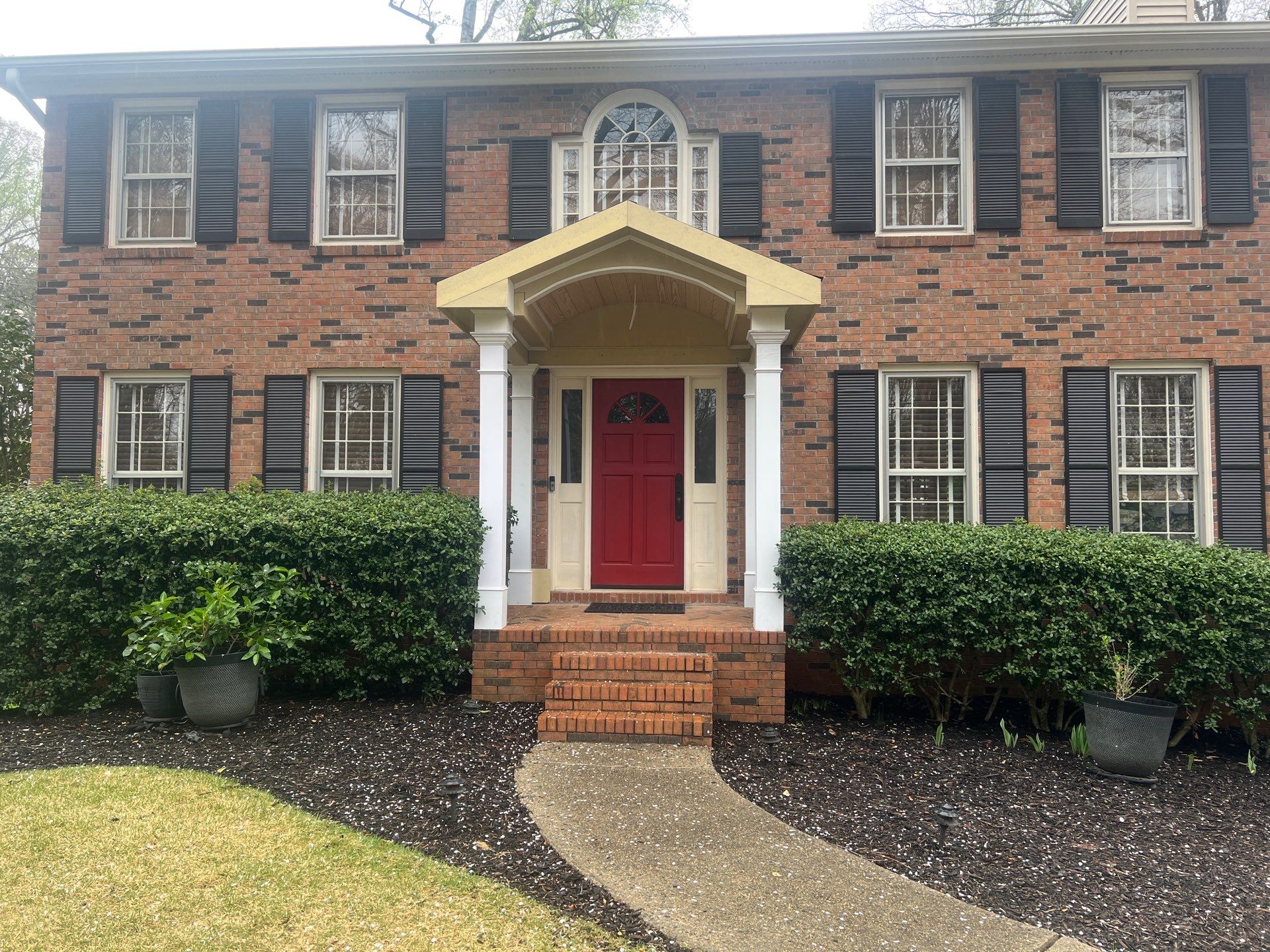 Exterior Entryway and Trim Renovation for Smyrna Brick Colonial by Swift Home Renovations
