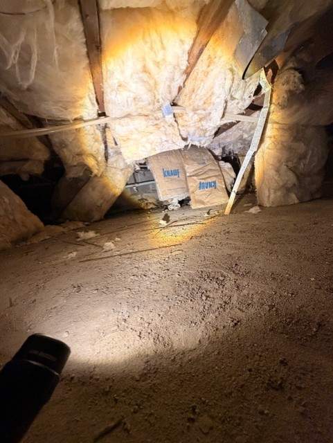 Crawlspace cleaning by Newhouse Restoration