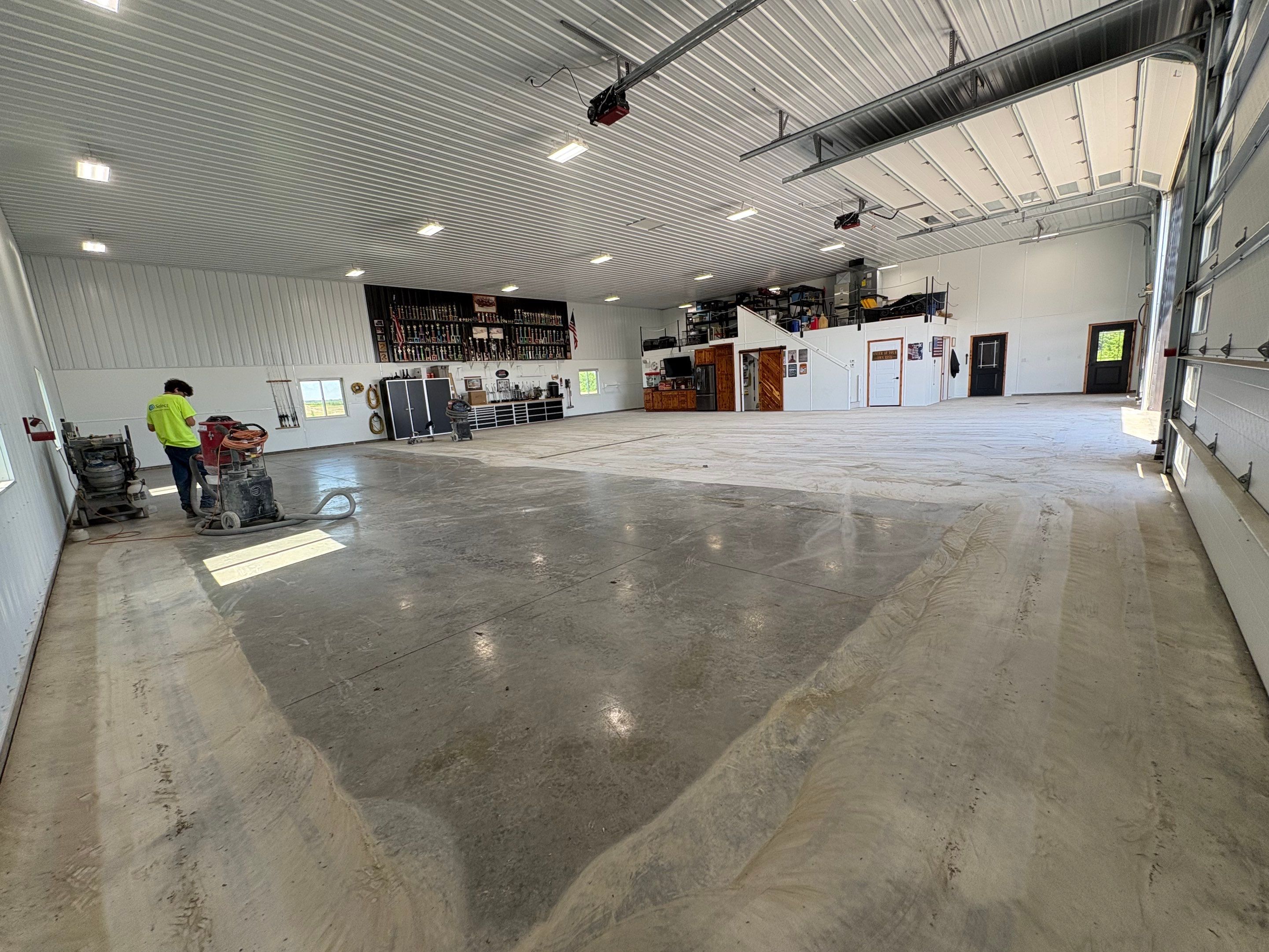 Multi-Stage Concrete Floor Coating for Egan Shop and RV Storage by Select Painting, Coatings & Garage Cabinets
