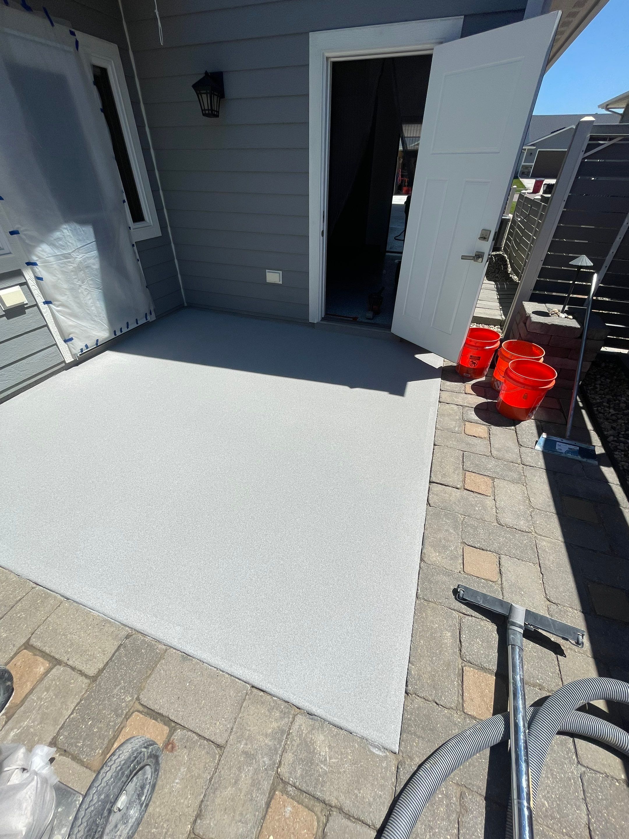 Concrete Patio Coating with Fuzzy Wool Finish in Sioux Falls by Select Painting, Coatings & Garage Cabinets
