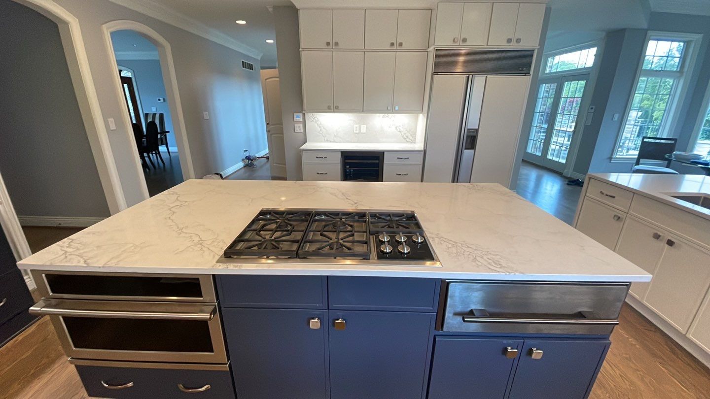 Kitchen Remodel using Fabuwood Luna Dove and Indigo Cabinetry by HomeWerkes Design & Build