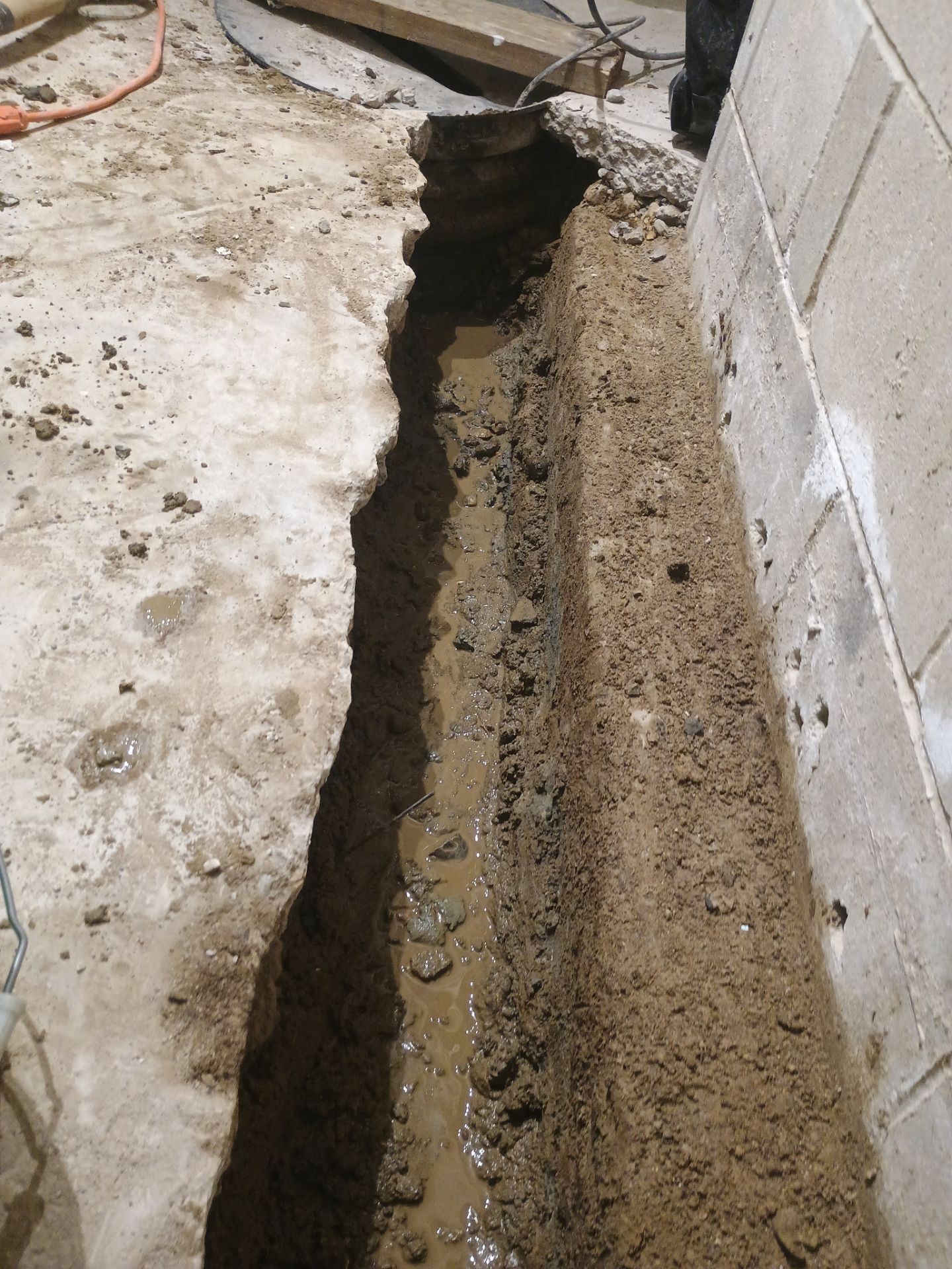 Interior Drain Tile Installation in Minnetonka, MN by Waterproofing Northeast