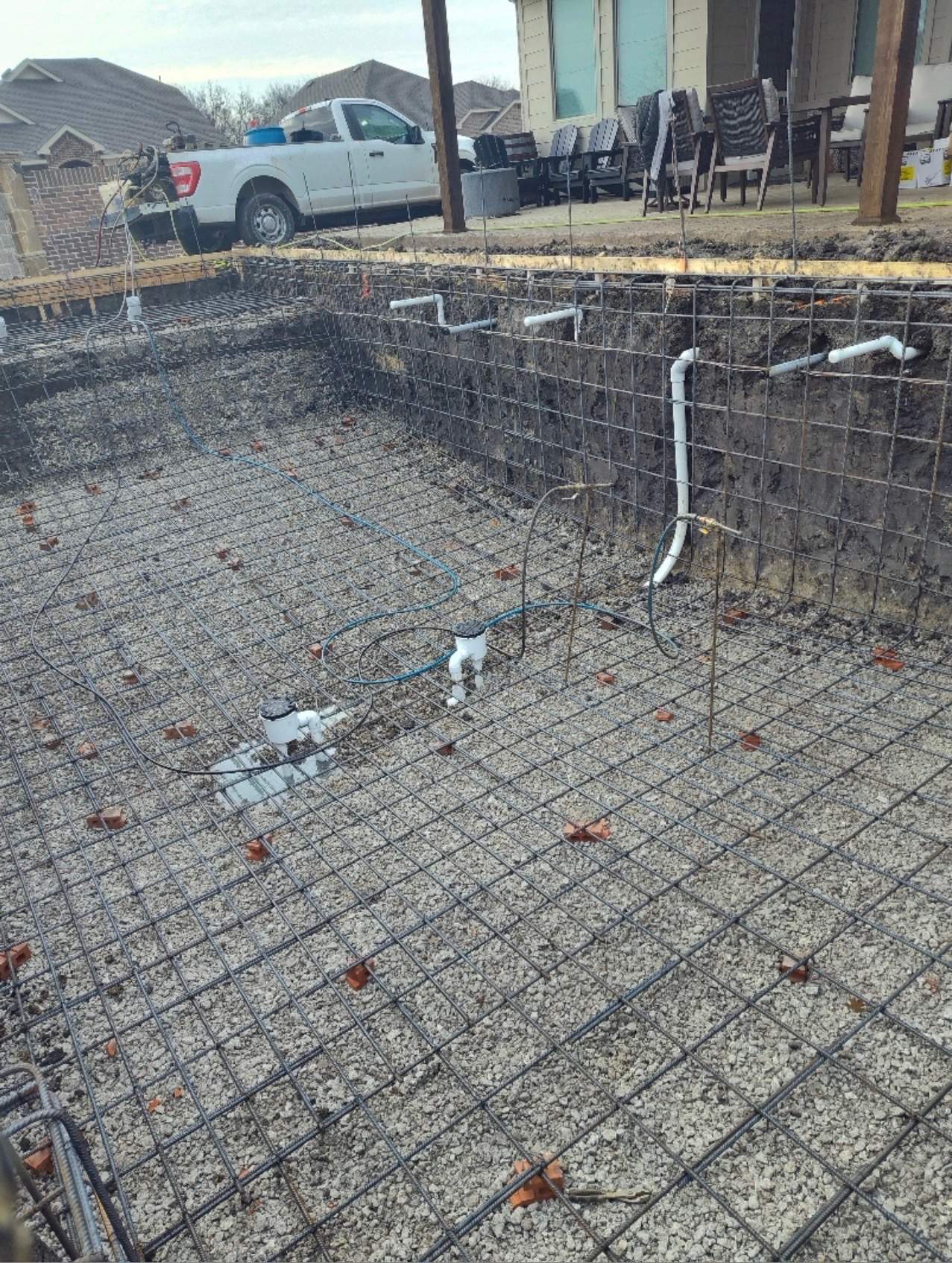 Rectangular Pool with Tanning Ledge and Waterfall by Pinnacle Pools and Spas - DFW