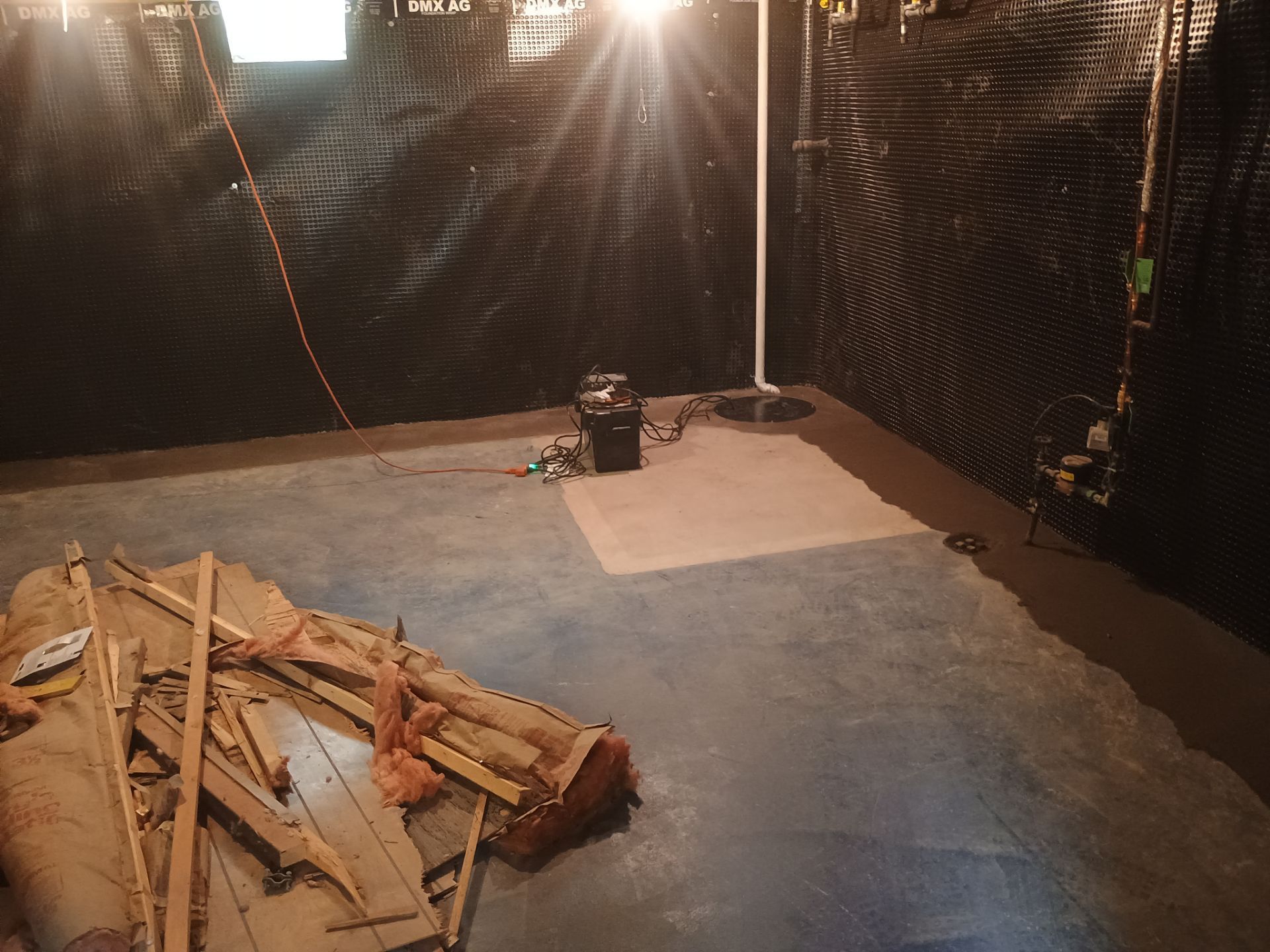 Interior Drain Tile & Buried Discharge in South Minneapolis by Waterproofing Northeast