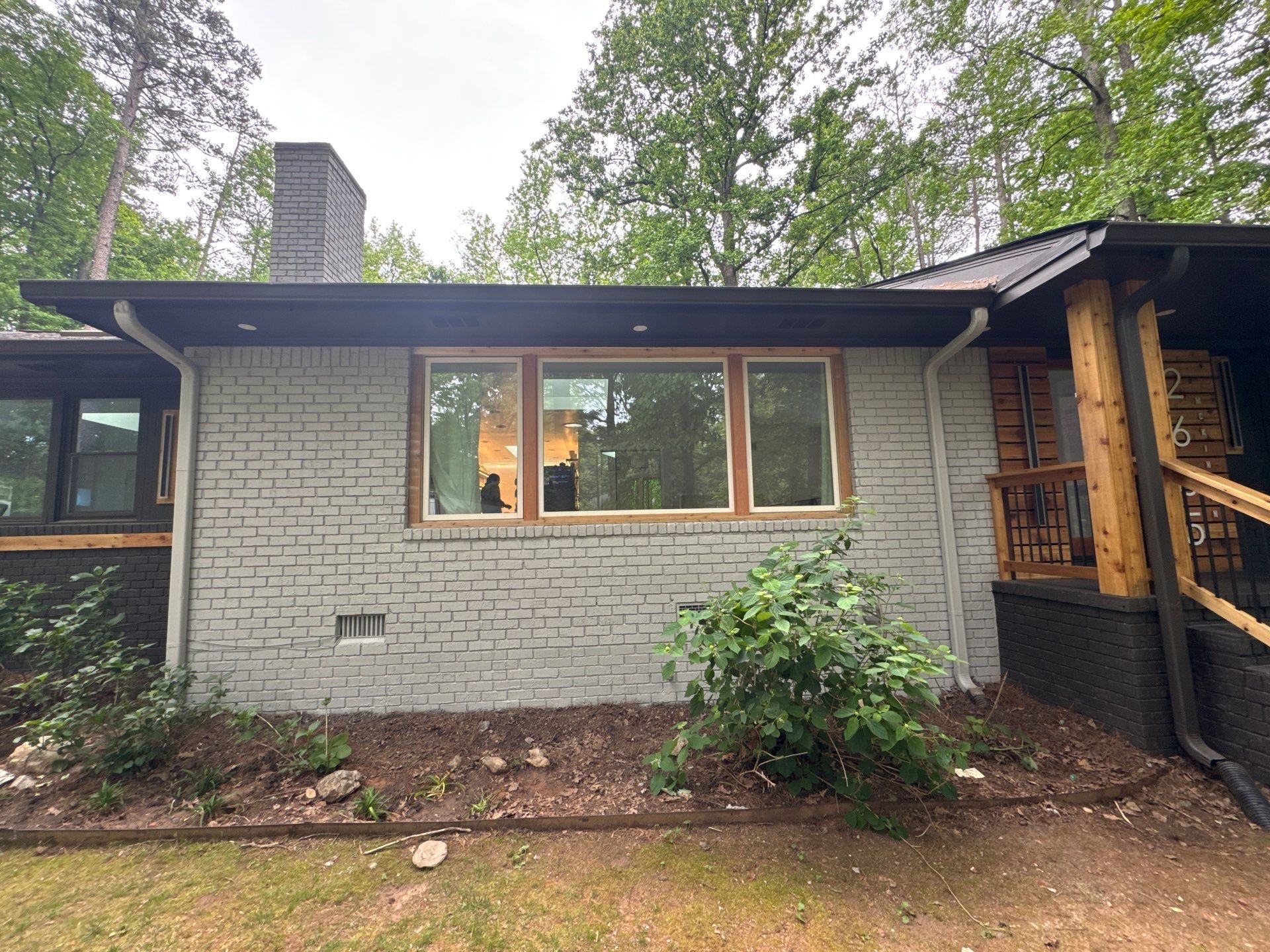 Modern Exterior Transformation and Multi-Tiered Deck Installation in Decatur by Swift Home Renovations