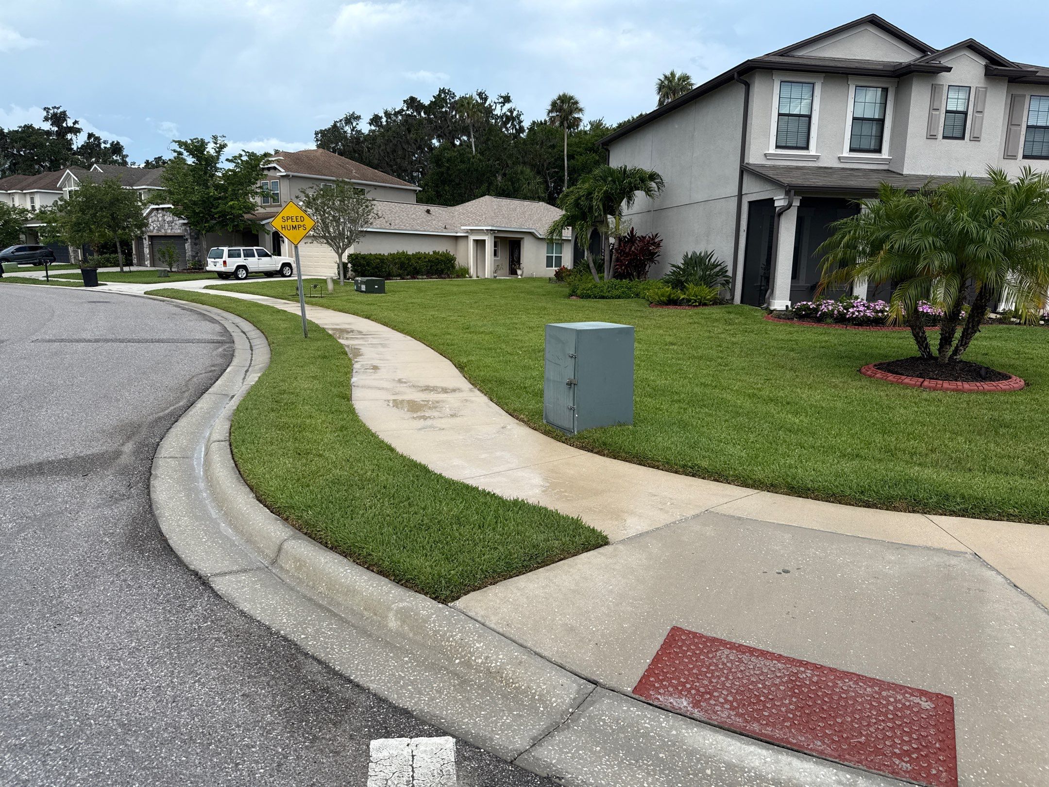 Large Corner Lot Concrete Cleaning in Old Mill Preserve – Palmetto, FL by Sunshine AquaWash