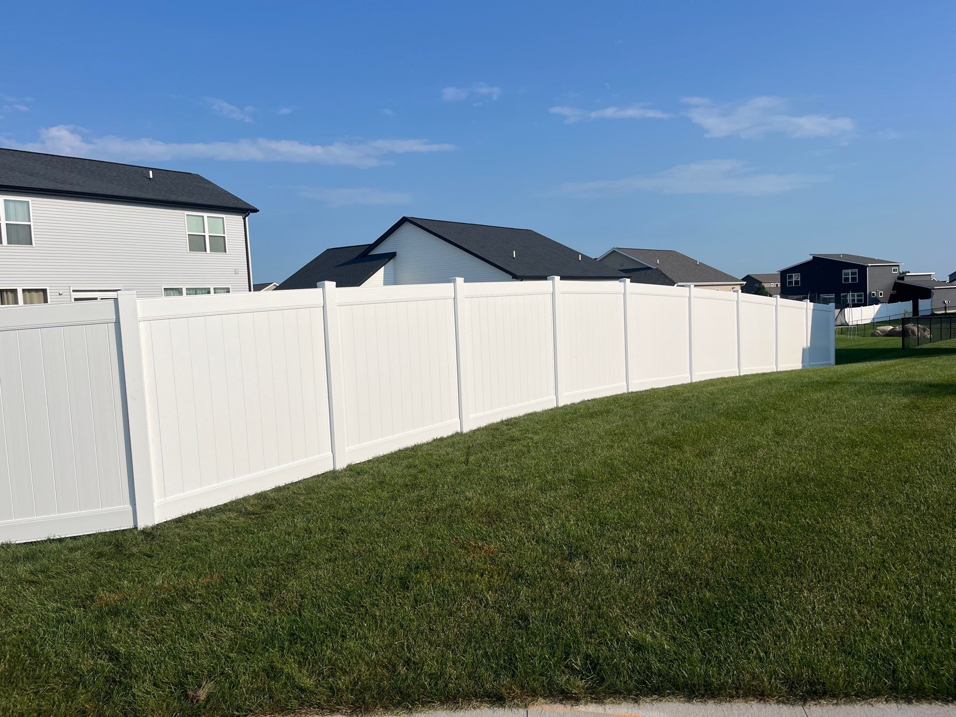 White Vinyl Privacy Fence Installation With Double Gates in Waterloo by Perfect Picket Fence and Stain