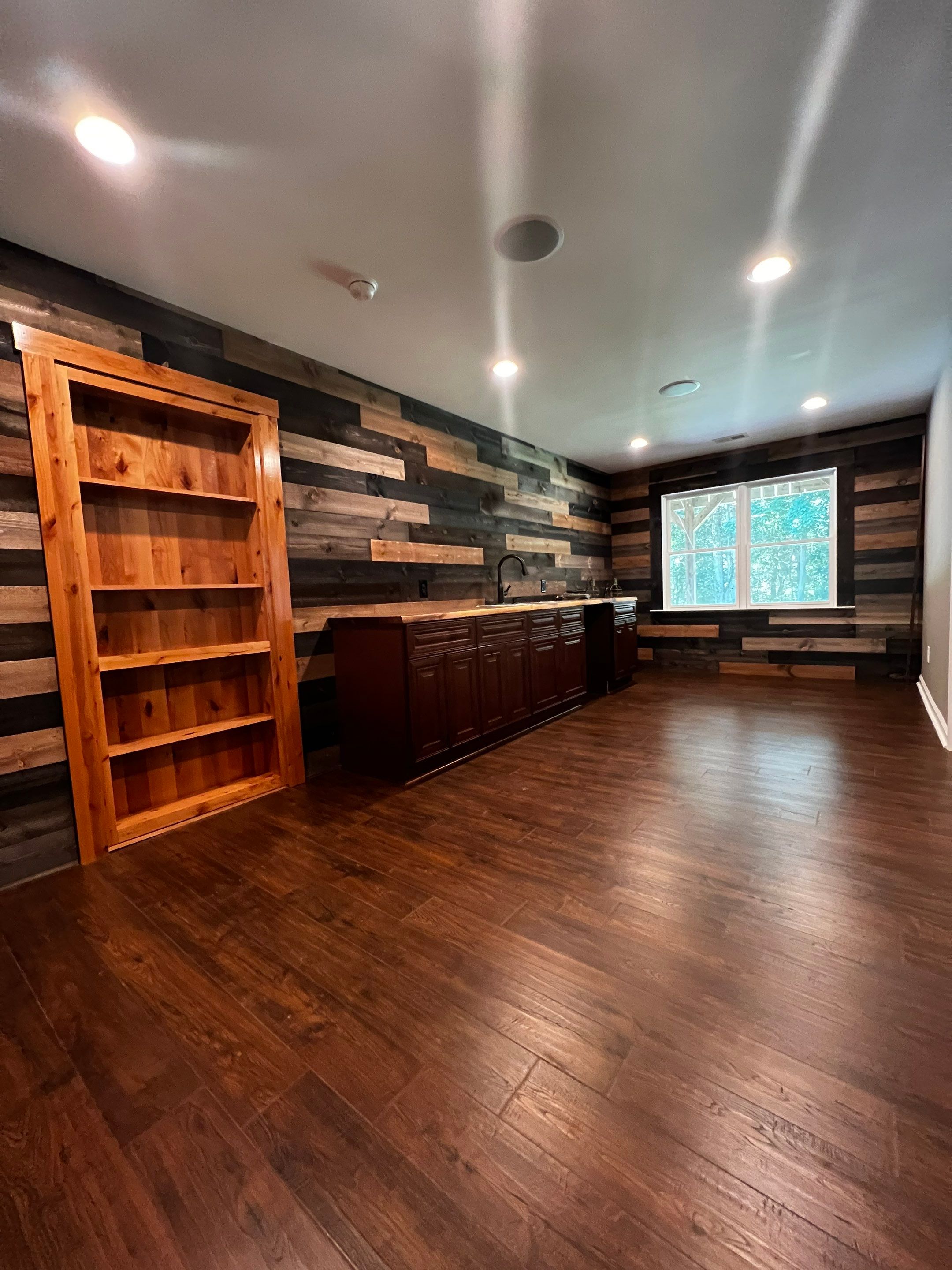 Custom Basement Remodeling With Home Theater and Bar in Woodstock by Swift Home Renovations