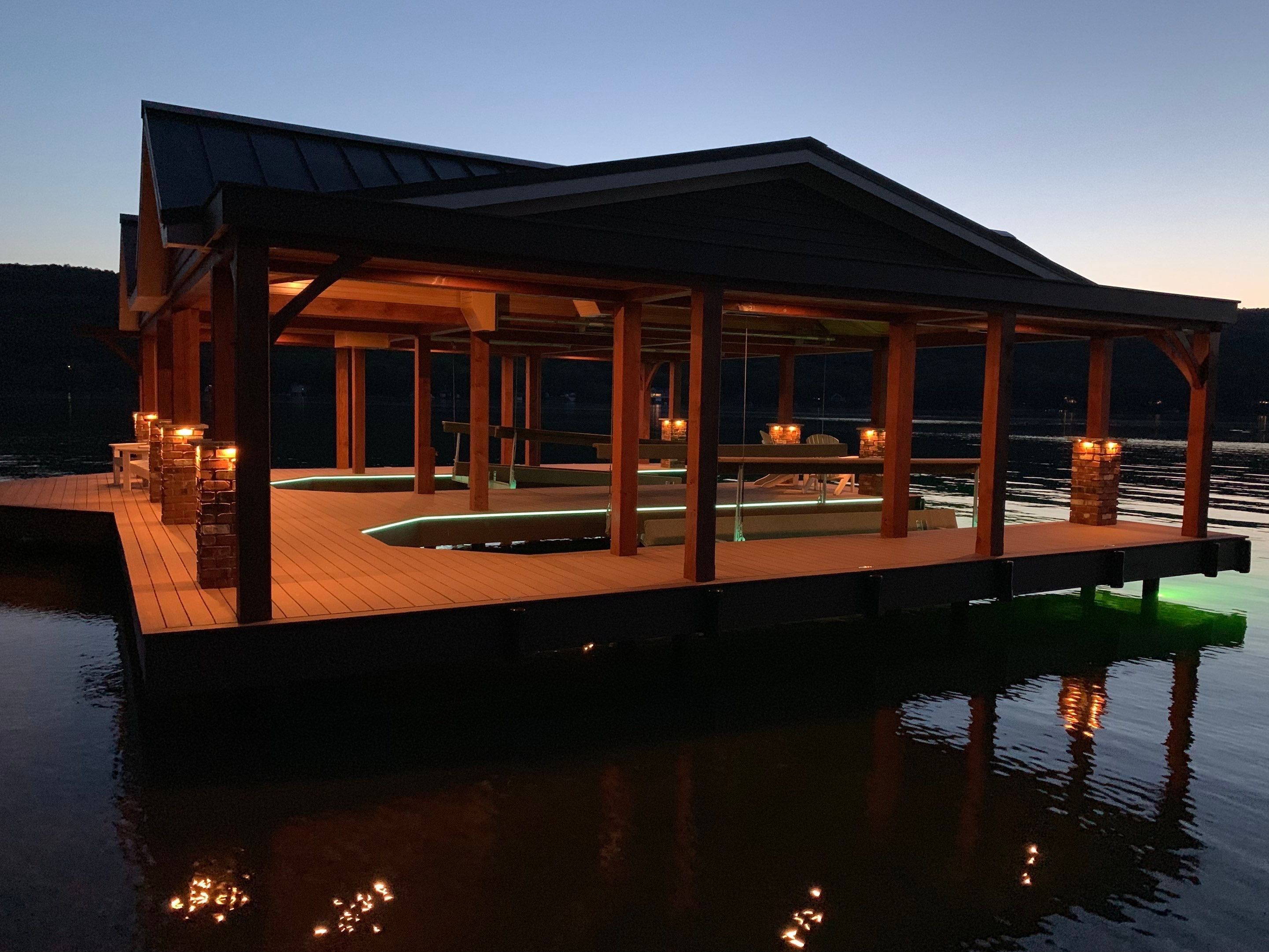 Custom Timber-Framed Boat Dock with Multi-Color LED Lighting on Keuka Lake, New York by Outdoor Lights + Shades