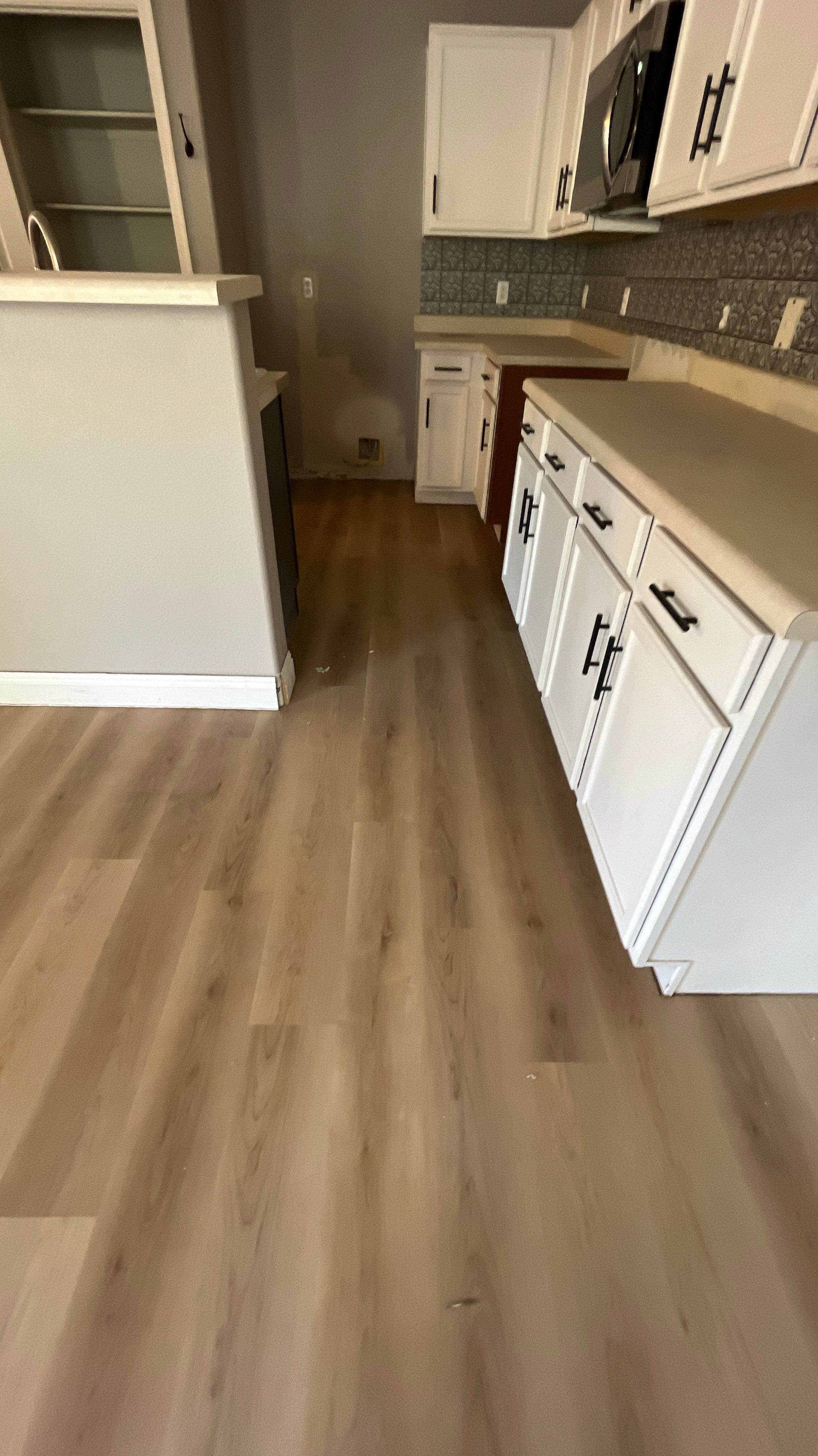 Flooring Installation using Luxury Vinyl Plank by Footprints Floors of Chandler 