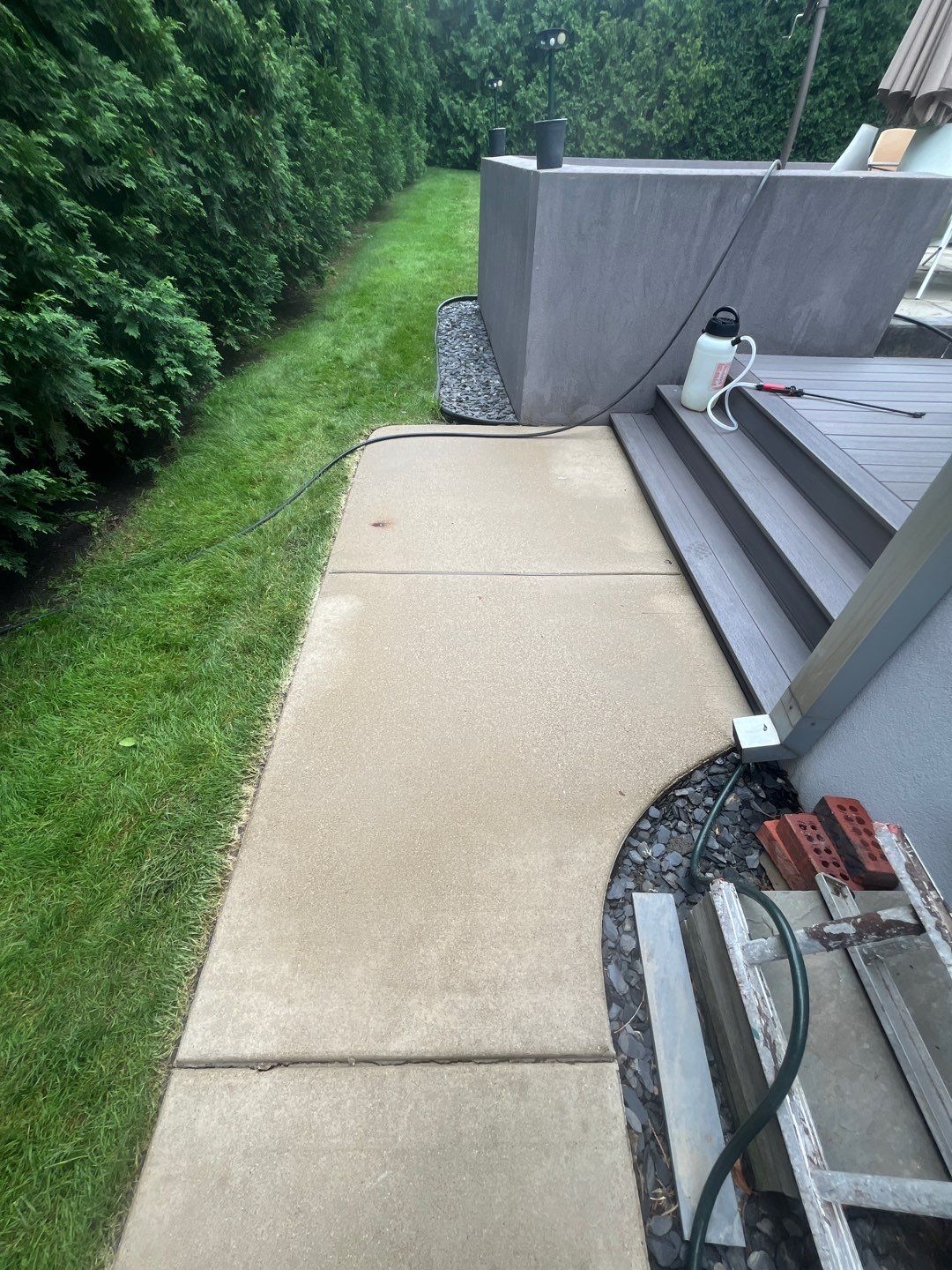 roof washing using Algaecide, soft wash soap by Northern Power Washing LLC.