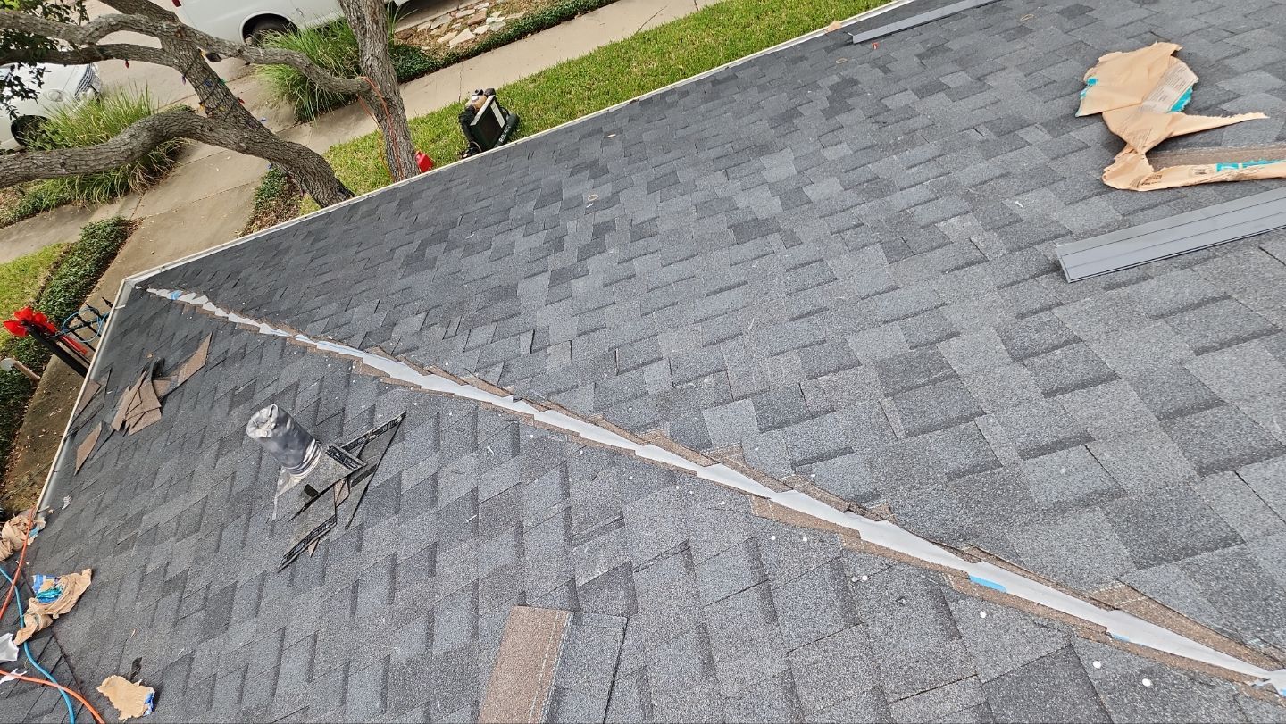 Residential Roofing Installation using Certainteed Landmark Moire Black by Galvan Roofing and Construction