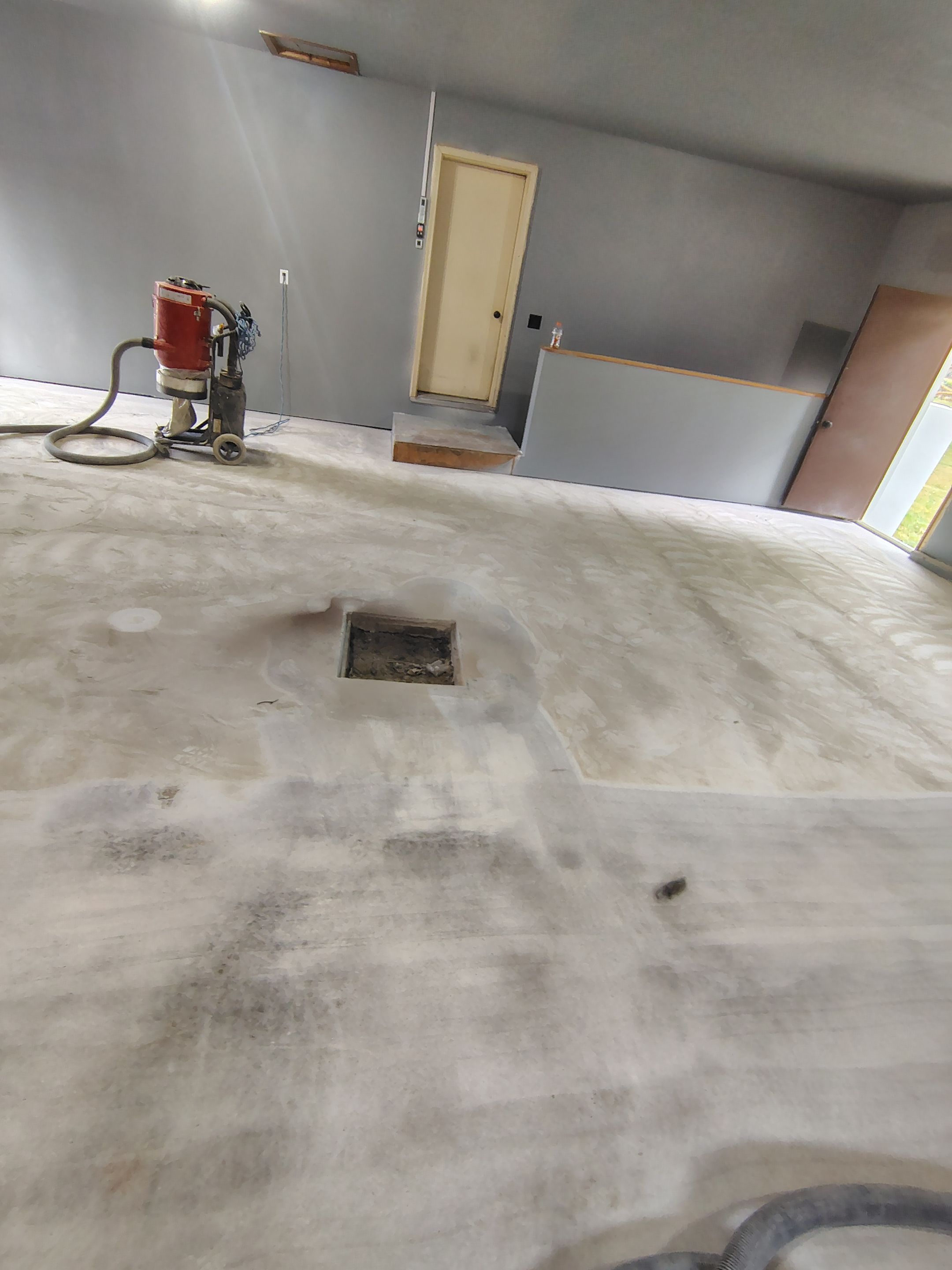 Garage Floor Concrete Coating and Surface Restoration in Colman by Select Painting, Coatings & Garage Cabinets