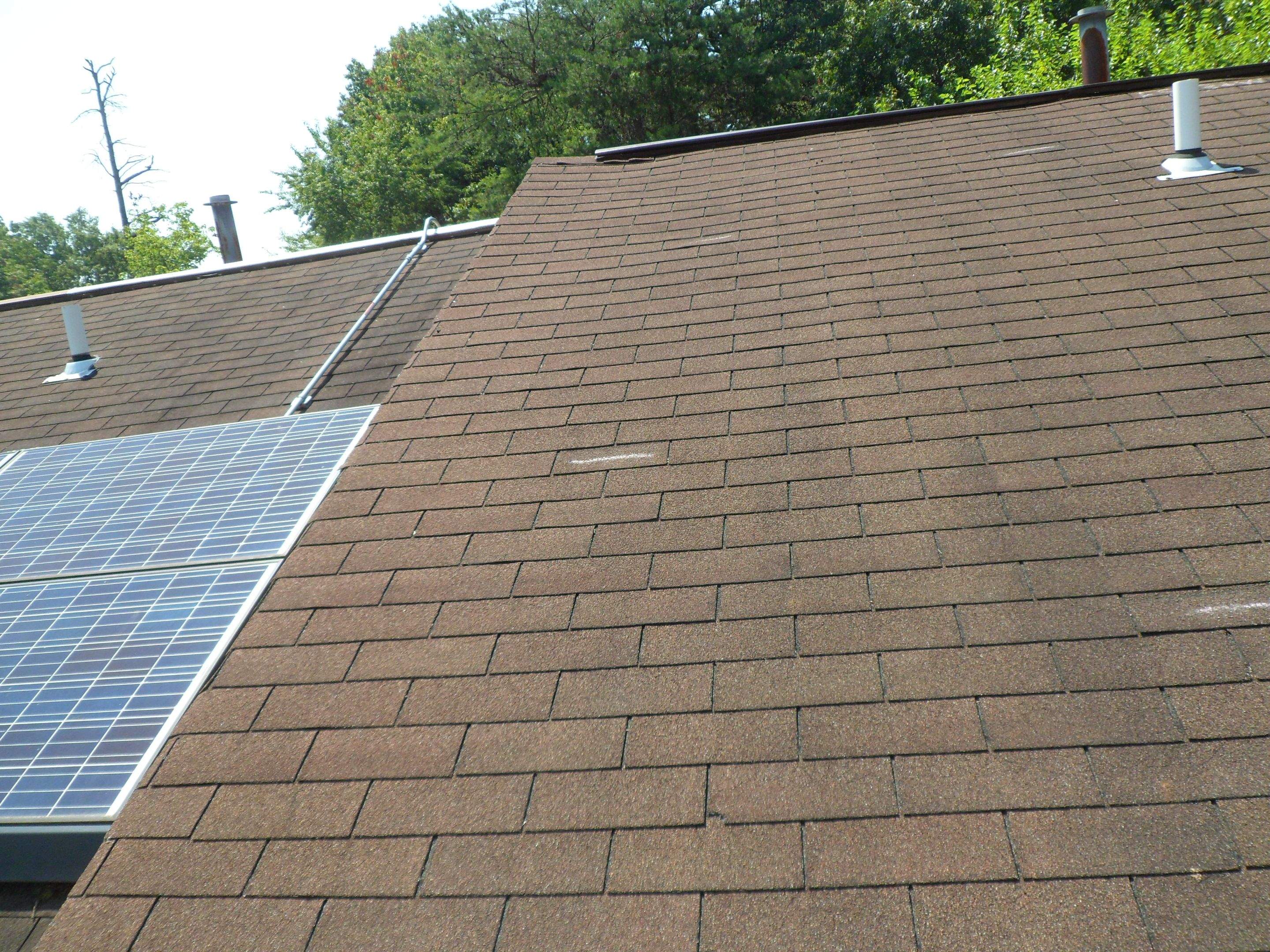 Residential Roofing Installation using Landmark Shingles Color Weatherwood by Alpha Design Services