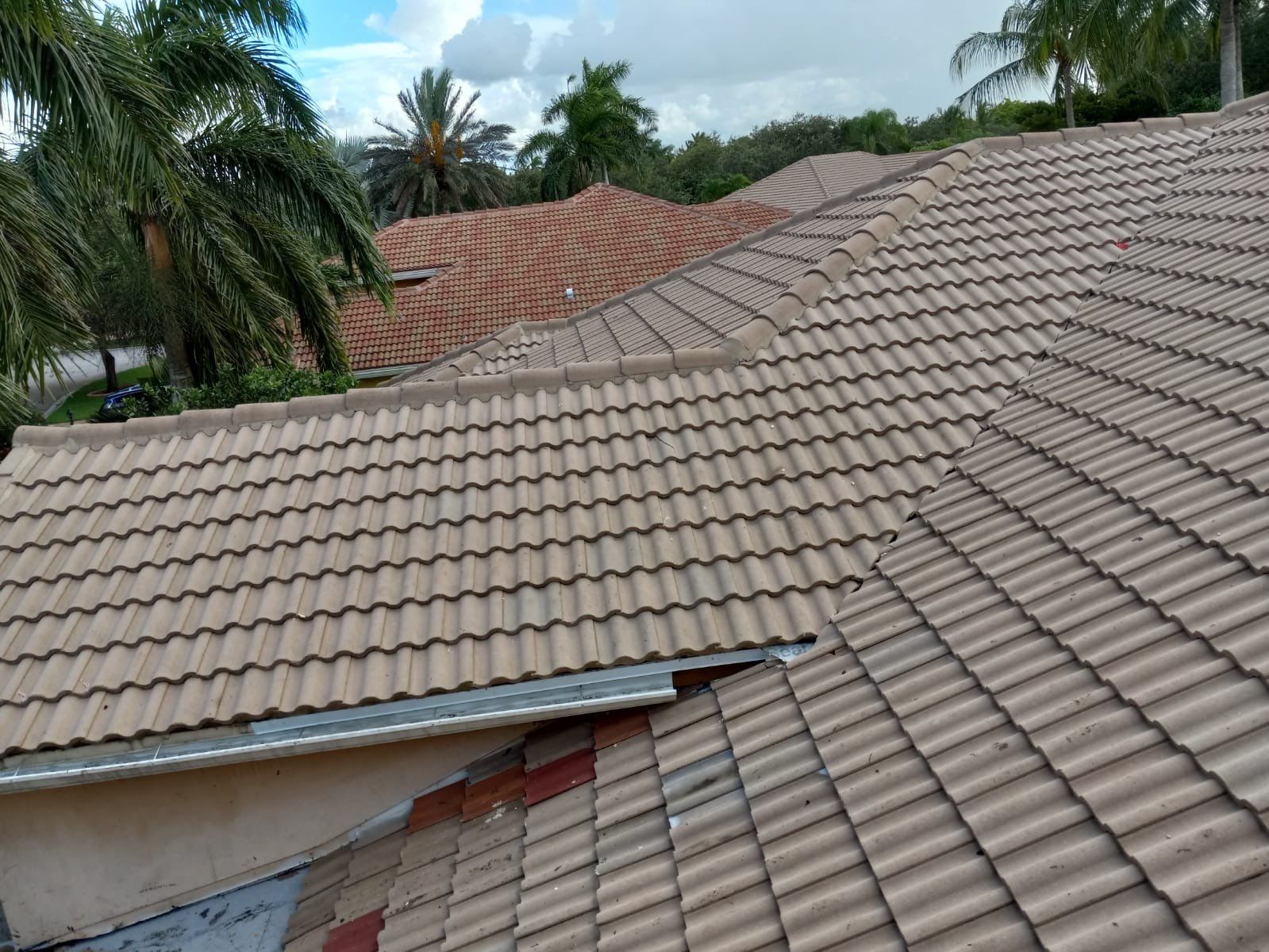 Concrete Tile Roof Leak Repair and Wood Decking Replacement in Parkland by Aastro Roofing