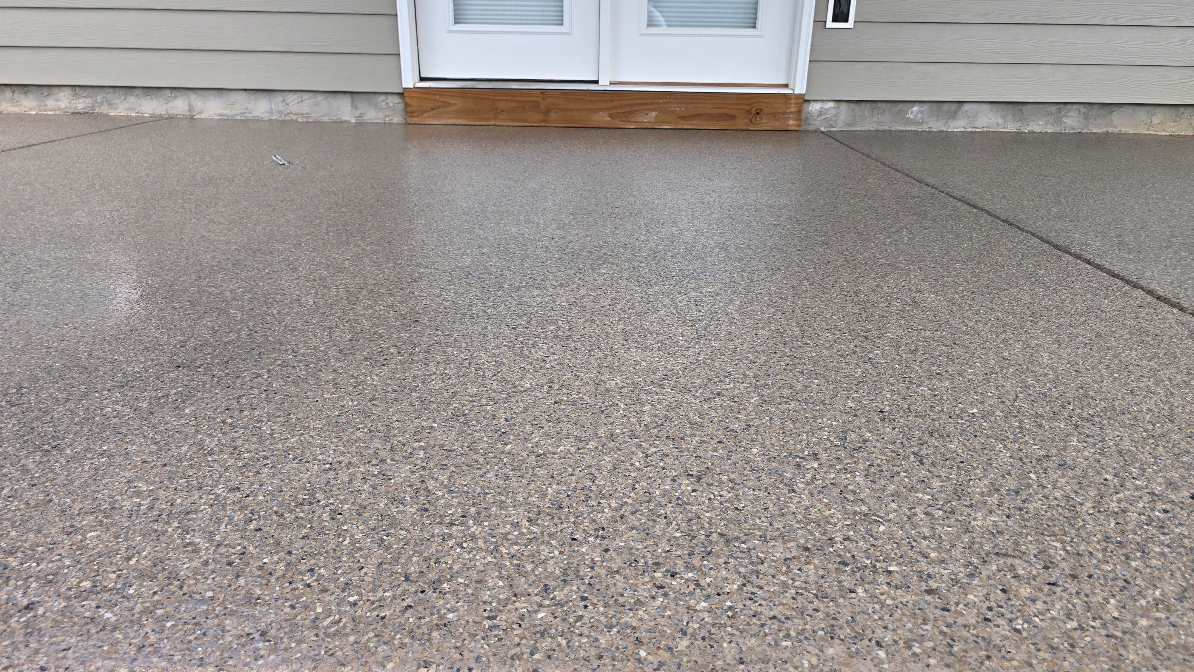 Porch & Patio Completed Using Obsidian & Pumice by Elite Floor Solutions