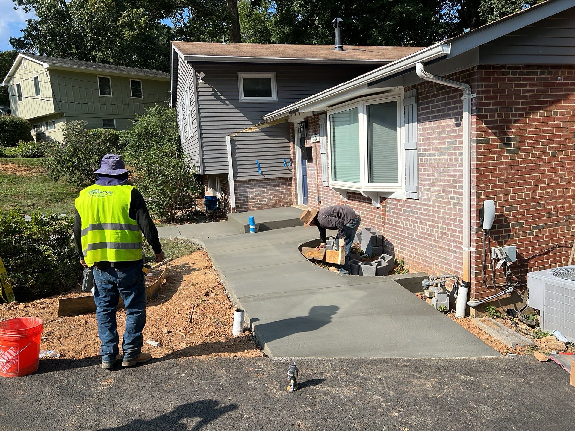New walkway with stairs and a new front porch by Fairfax Contractors, LLC