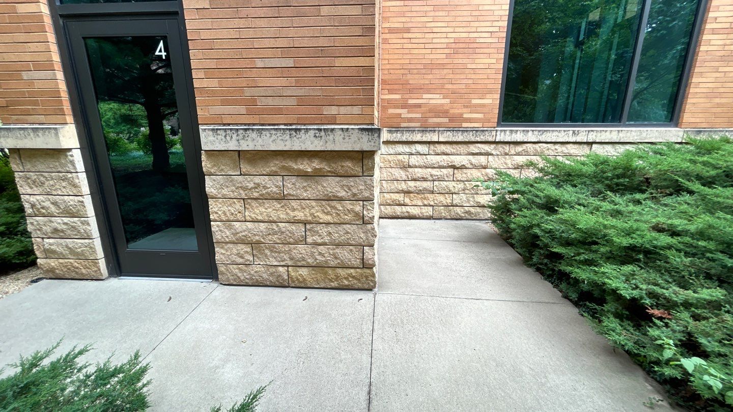 natural stone using Algaecide, soft wash soap by Northern Power Washing LLC.