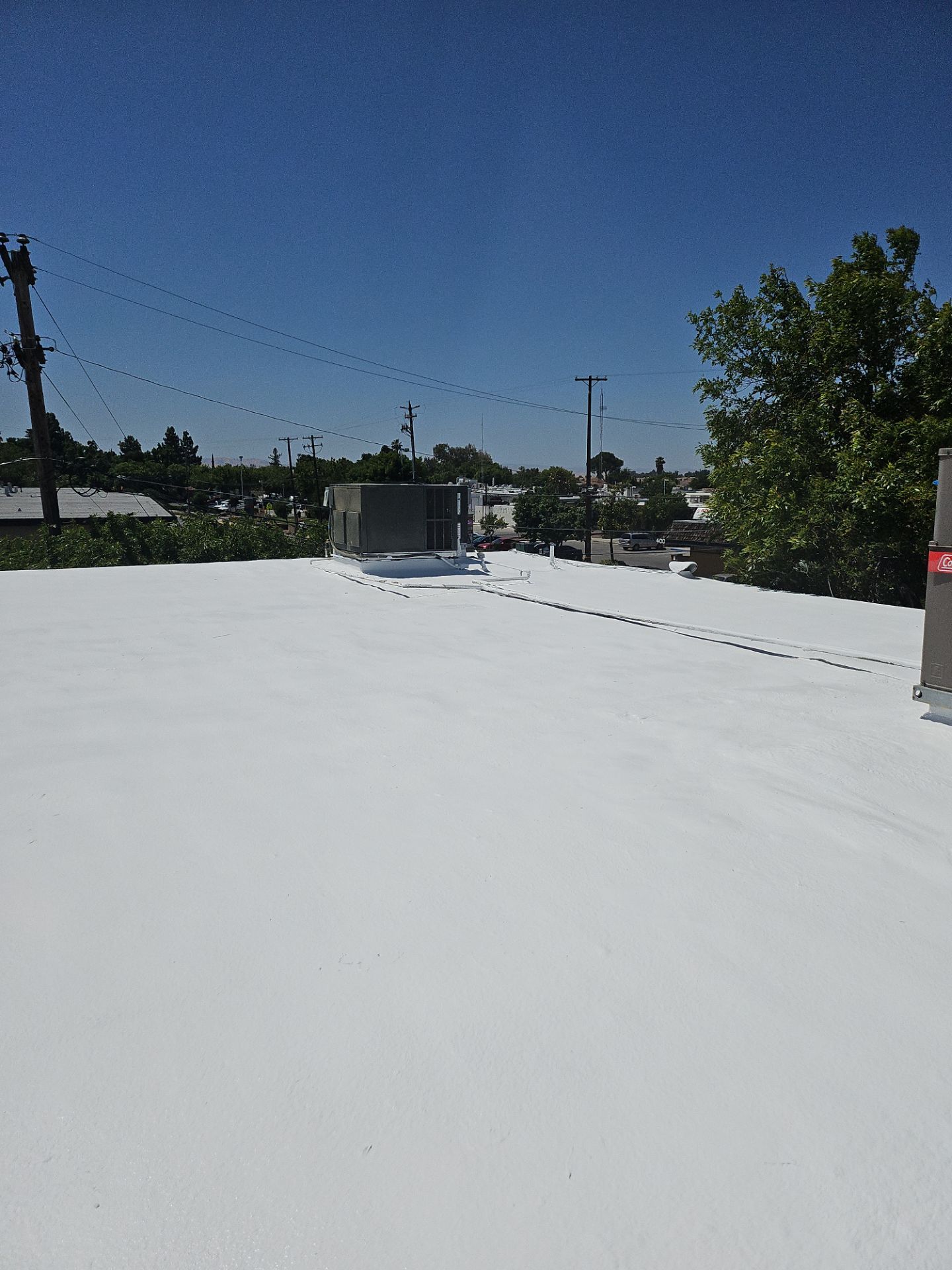 Foam Refurbish using General Coatings acrylic coatings and spray foam by Straight Edge Roofing Inc