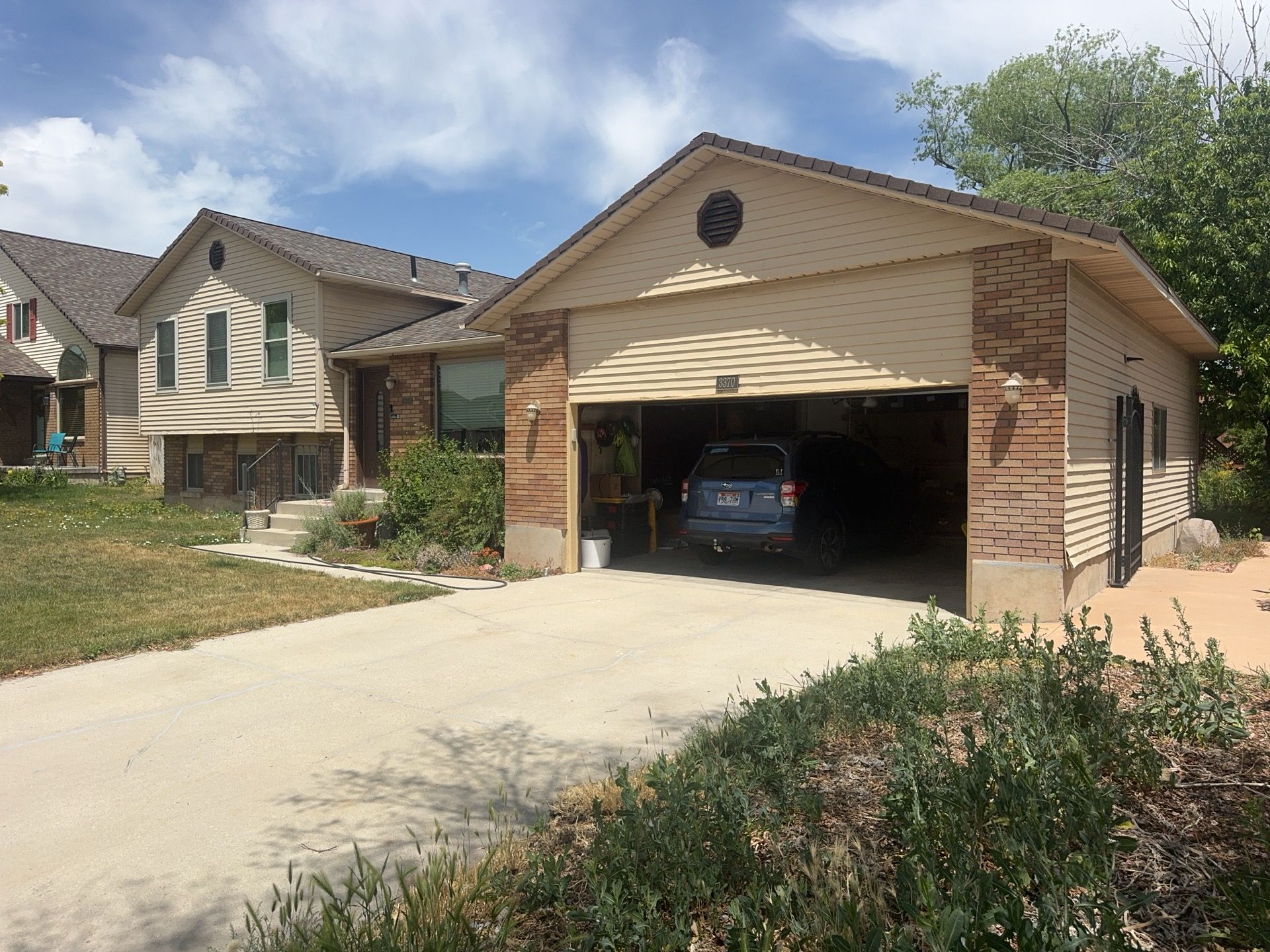 West Jordan | Hardie Lap Siding w/ Brick Accent | Boothbay Blue & Cobble Stone by Ideal Siding Utah