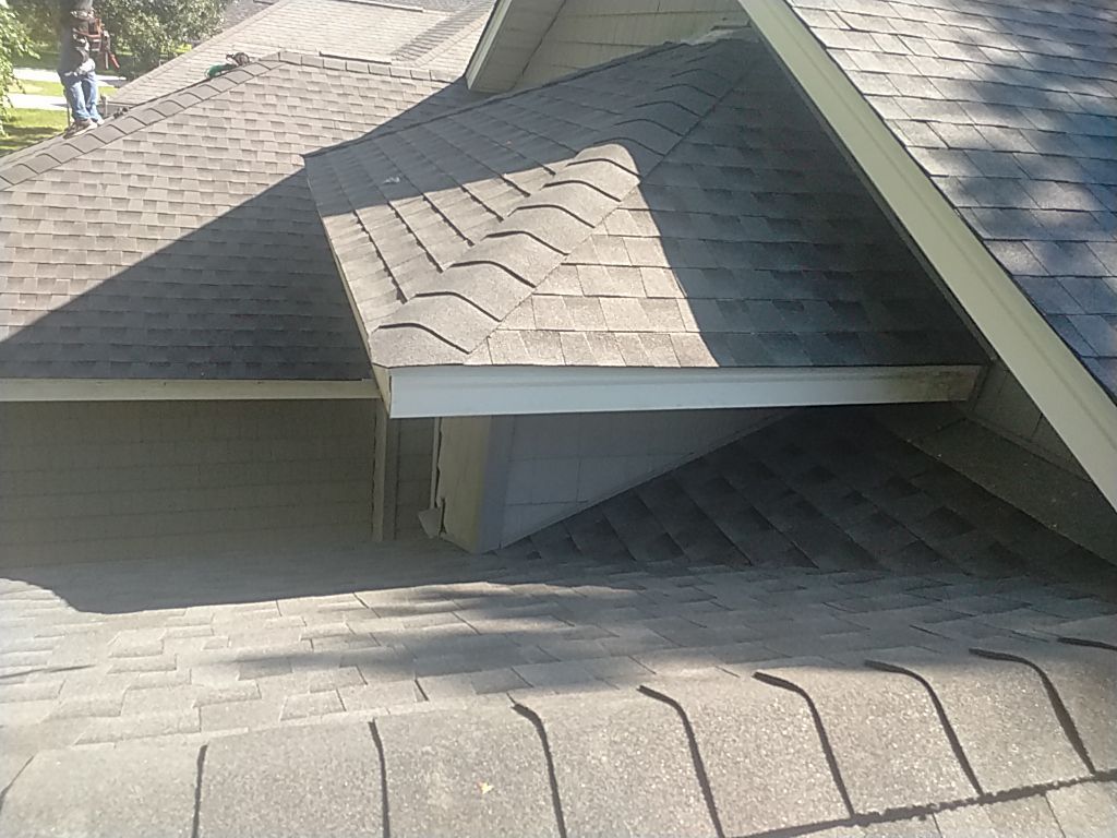 Residential Roofing Installation using Roof Replacement by American Roofing & Construction LLC