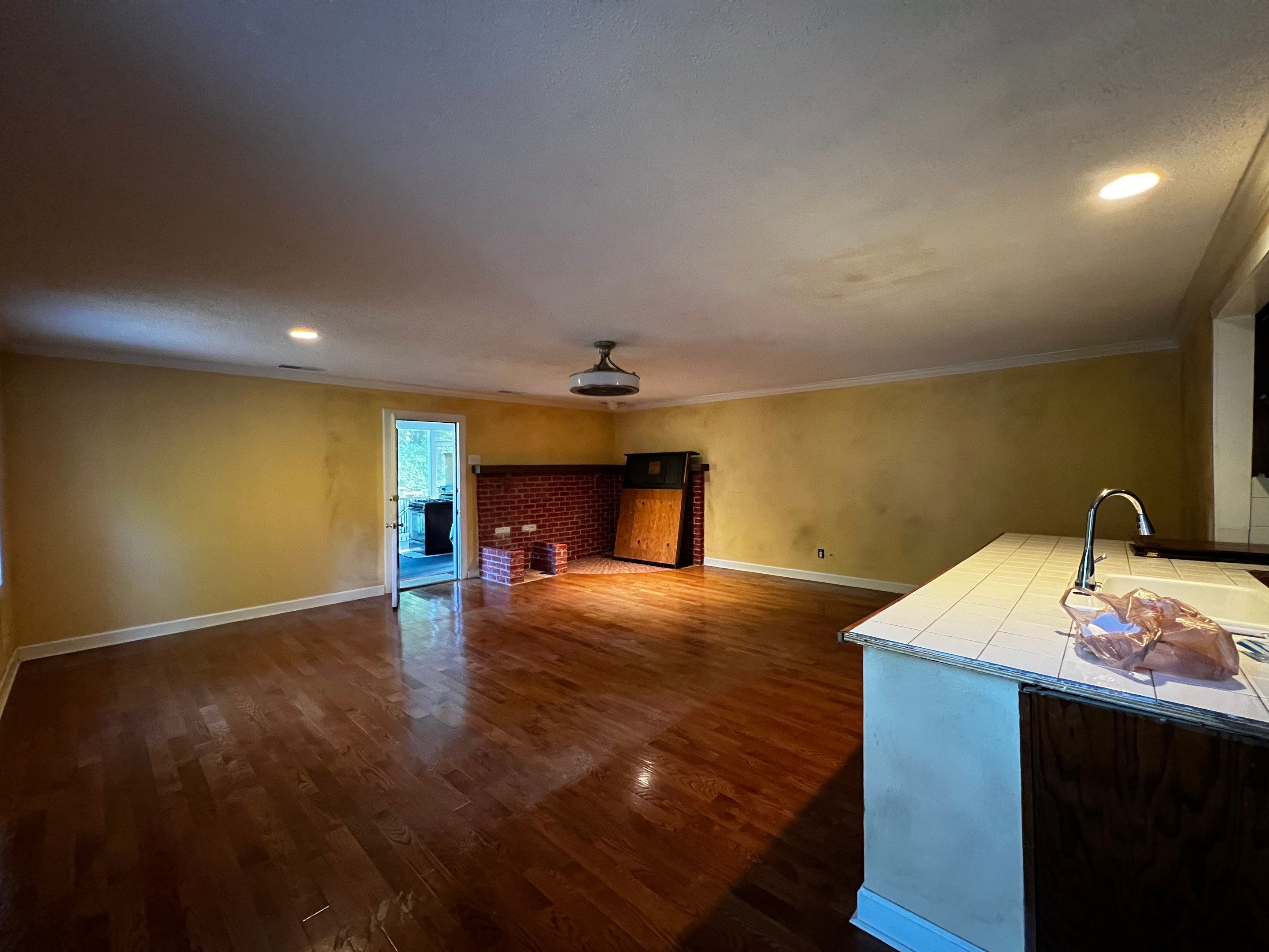 Kitchen and Living Area Renovation Featuring Hardwood Flooring in Smyrna by Swift Home Renovations