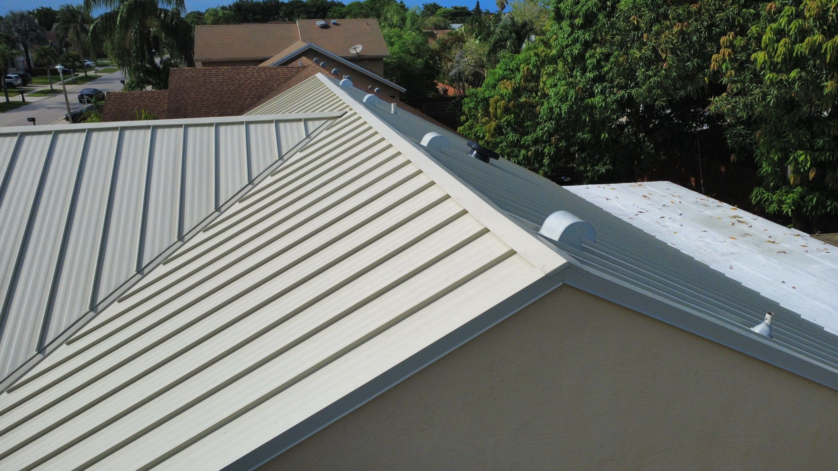 Residential Roofing Installation using 1.5'' Mechanical Seam by BLUES BROTHERS ROOFING