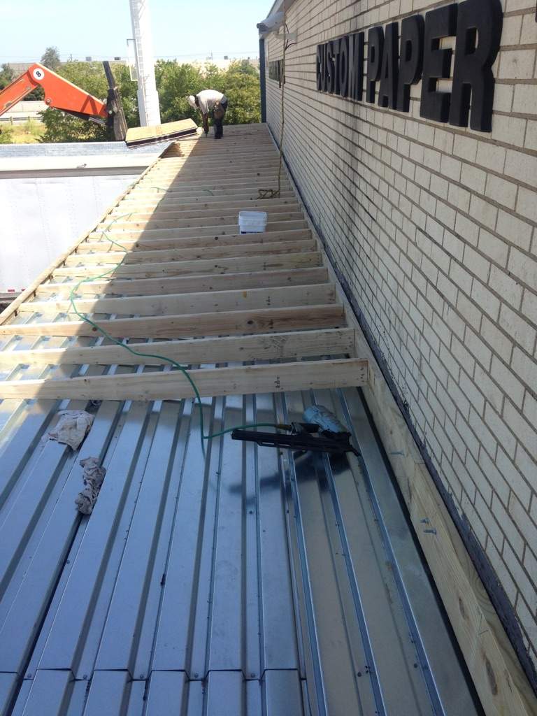 Massive Storm Damage Project - Factory in Arlington by First United Roofing & Construction