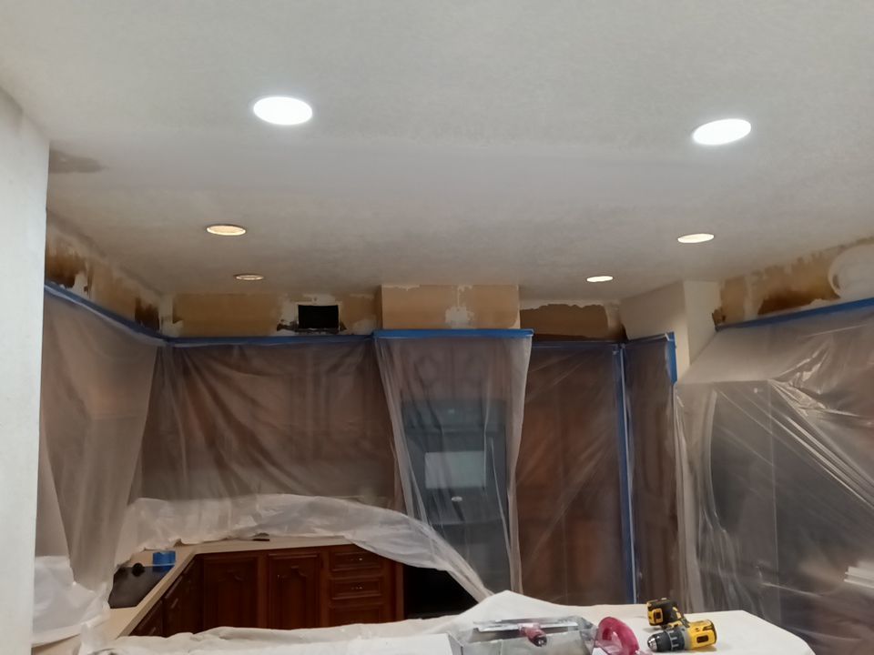 Interior and exterior painting project by Roof Concepts Construction