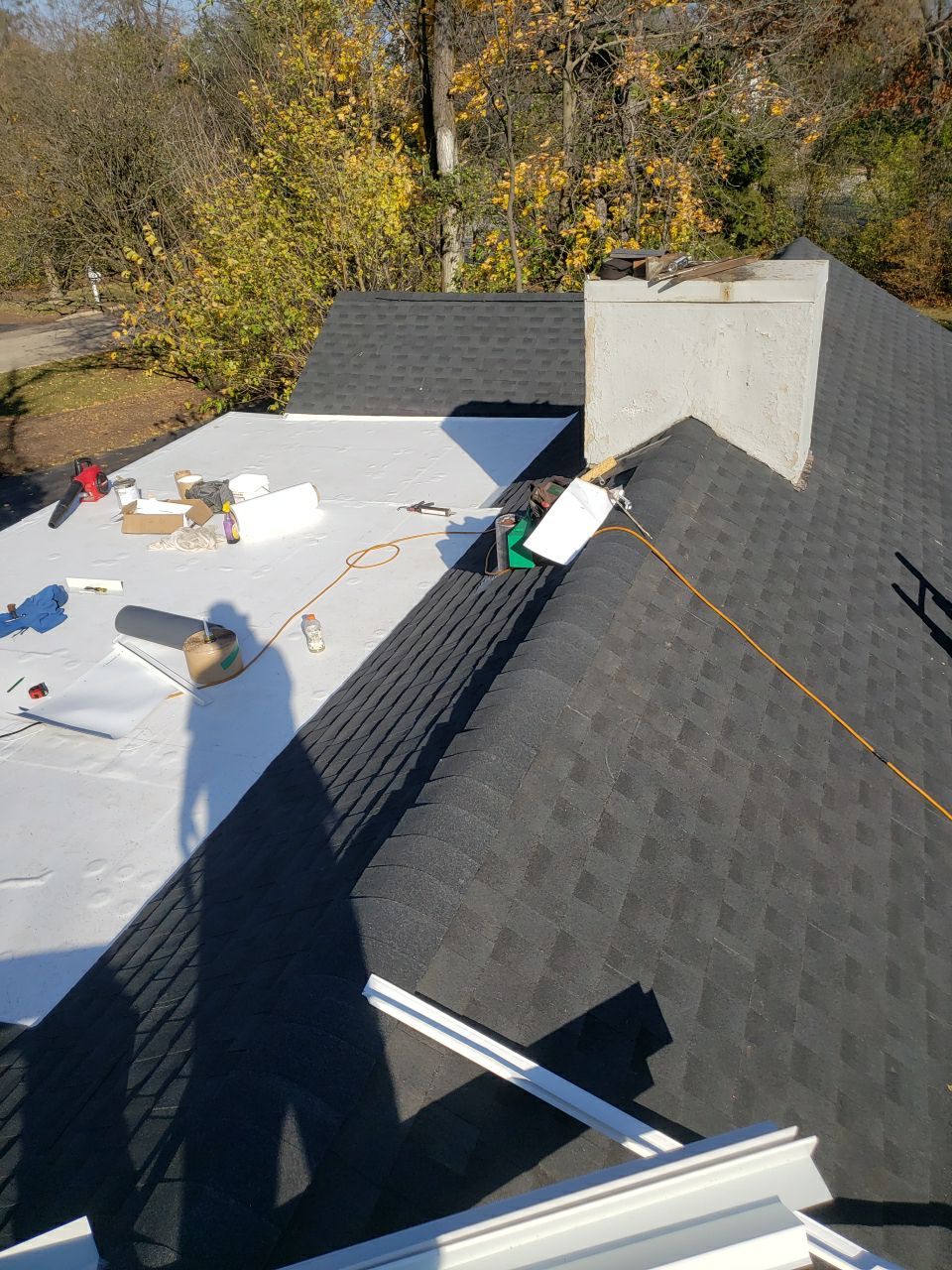 Asphalt Roof Replacement by Custom Installations